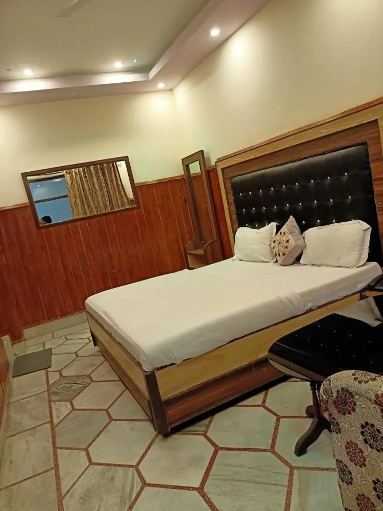 Bed in HOTEL HIMALYAN PARADISE