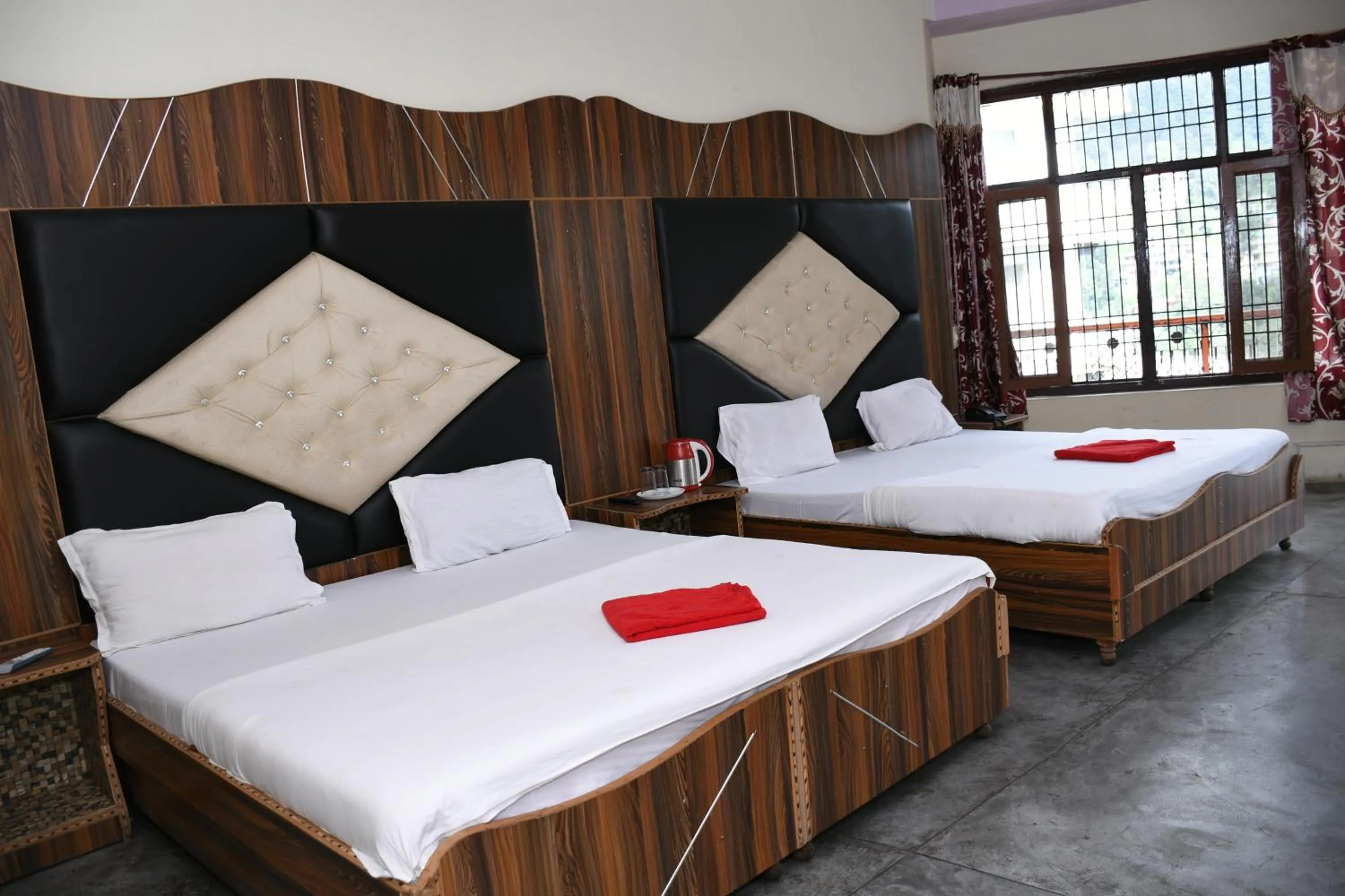 Bed in HOTEL HIMALYAN PARADISE