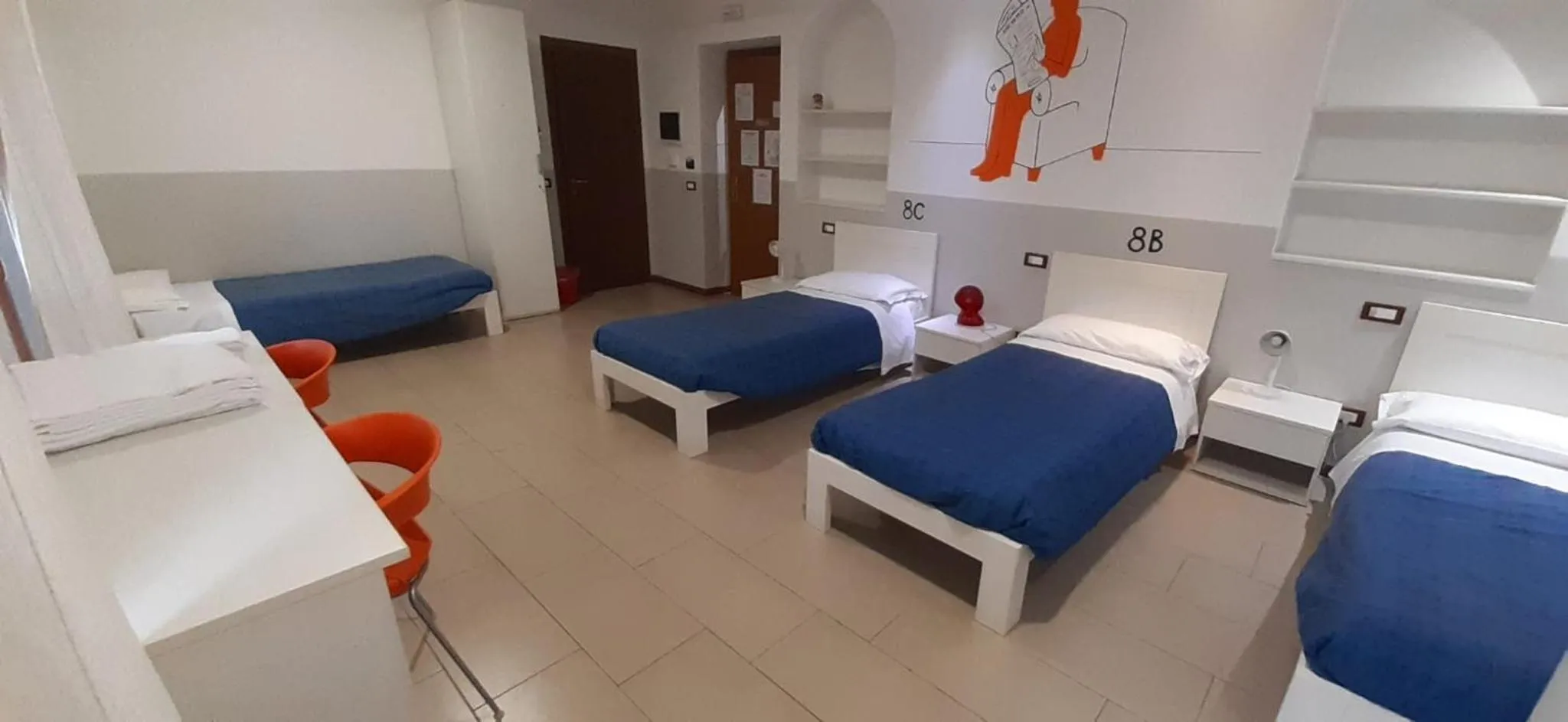 Quadruple Room with Balcony in L'Archetto