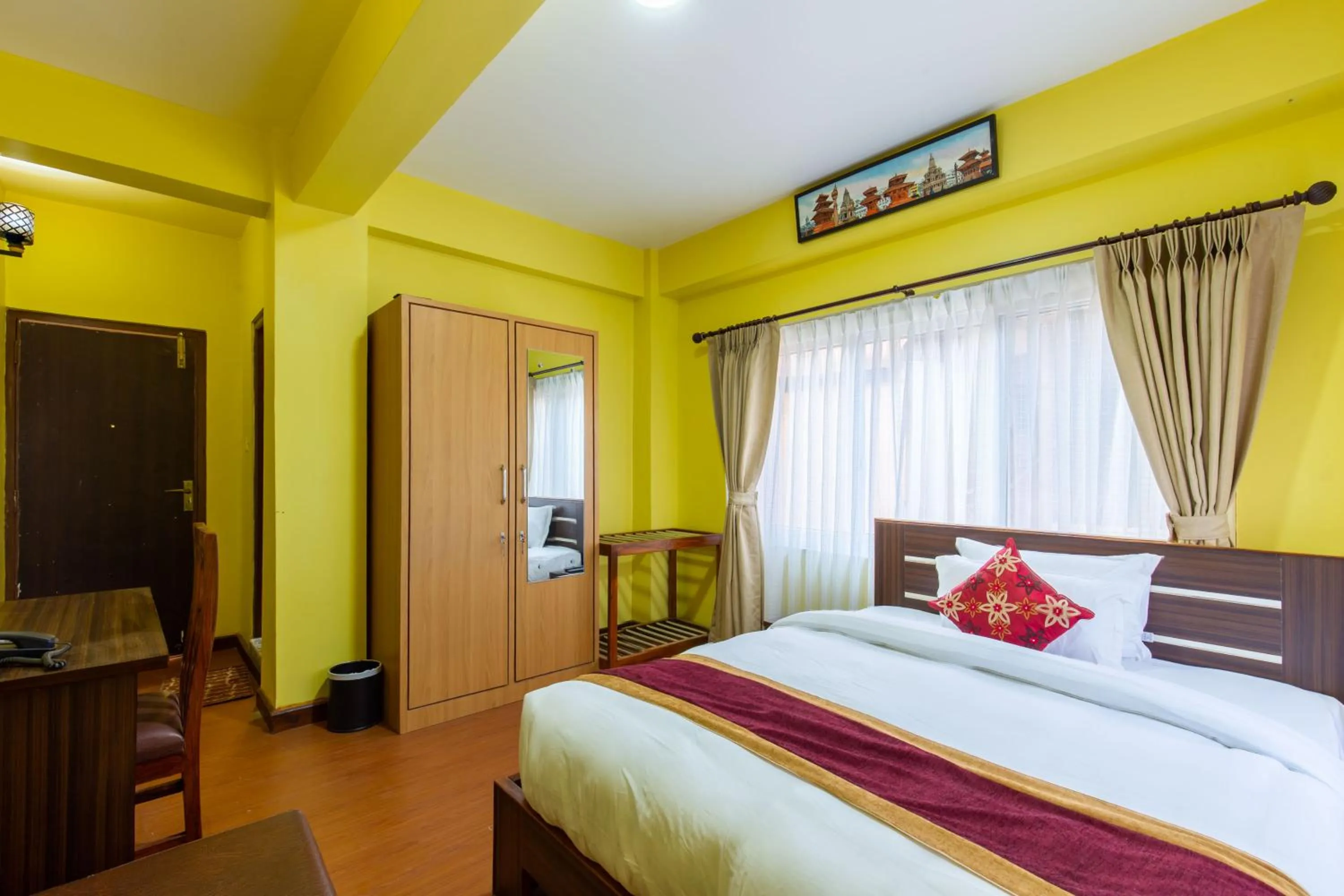 Bed in Deepjyoti Inn