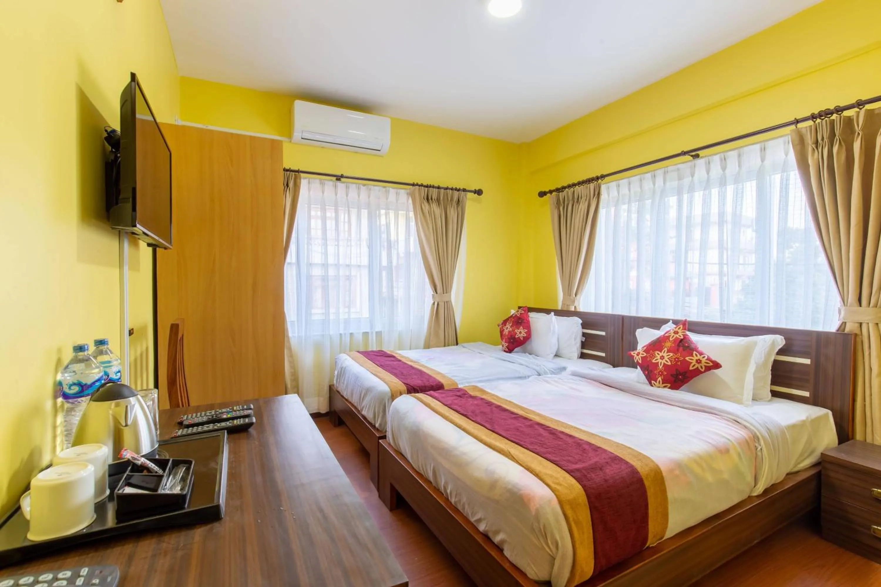 Bed in Deepjyoti Inn