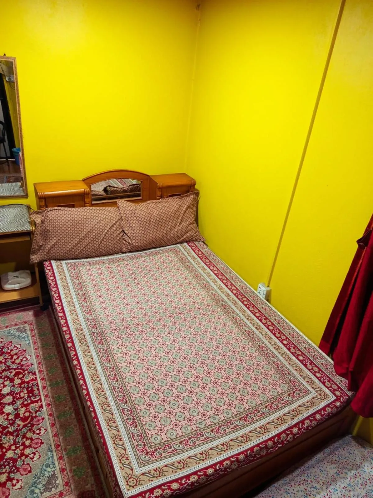 Bed in Deepjyoti Inn