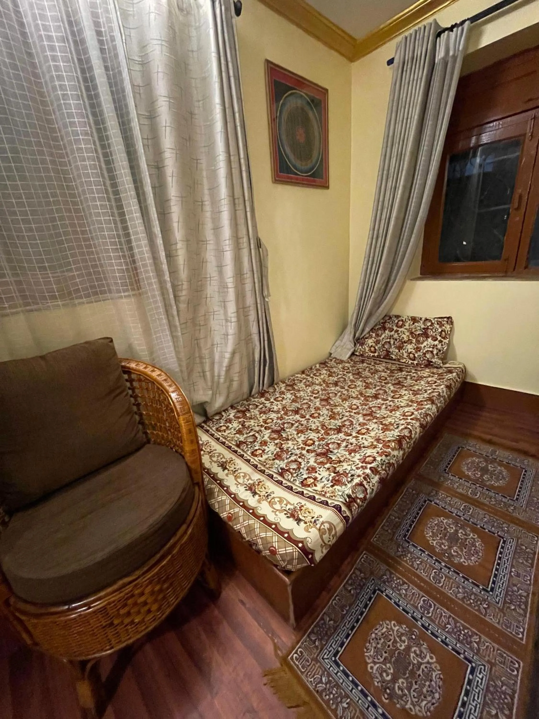 Bed in Deepjyoti Inn