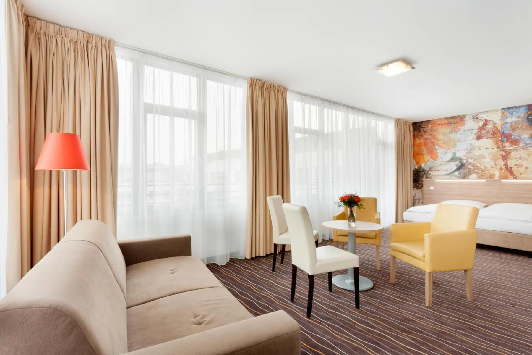 Seating area, Bed in Akcent hotel