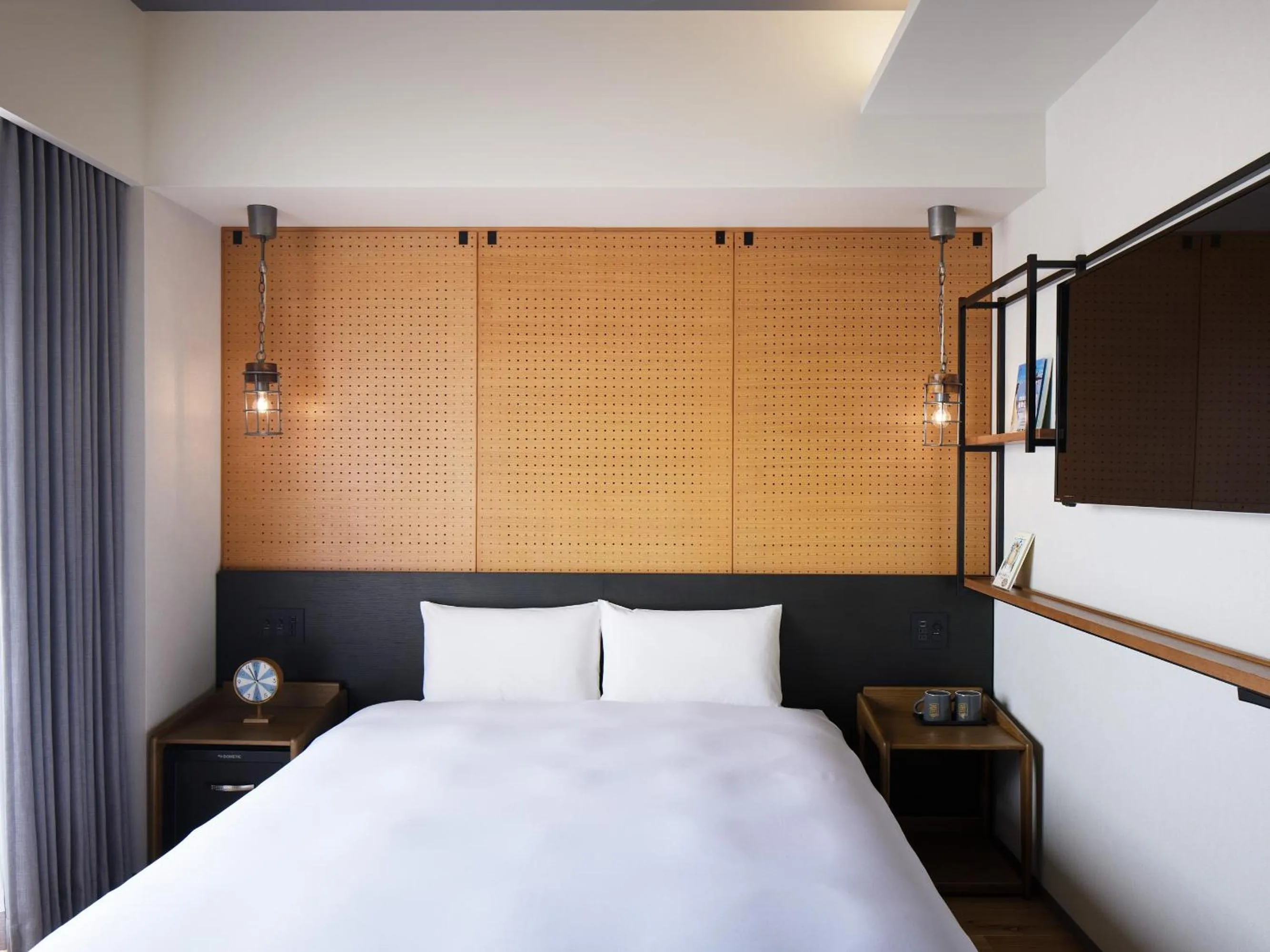 Bed in LAMP LIGHT BOOKS HOTEL fukuoka