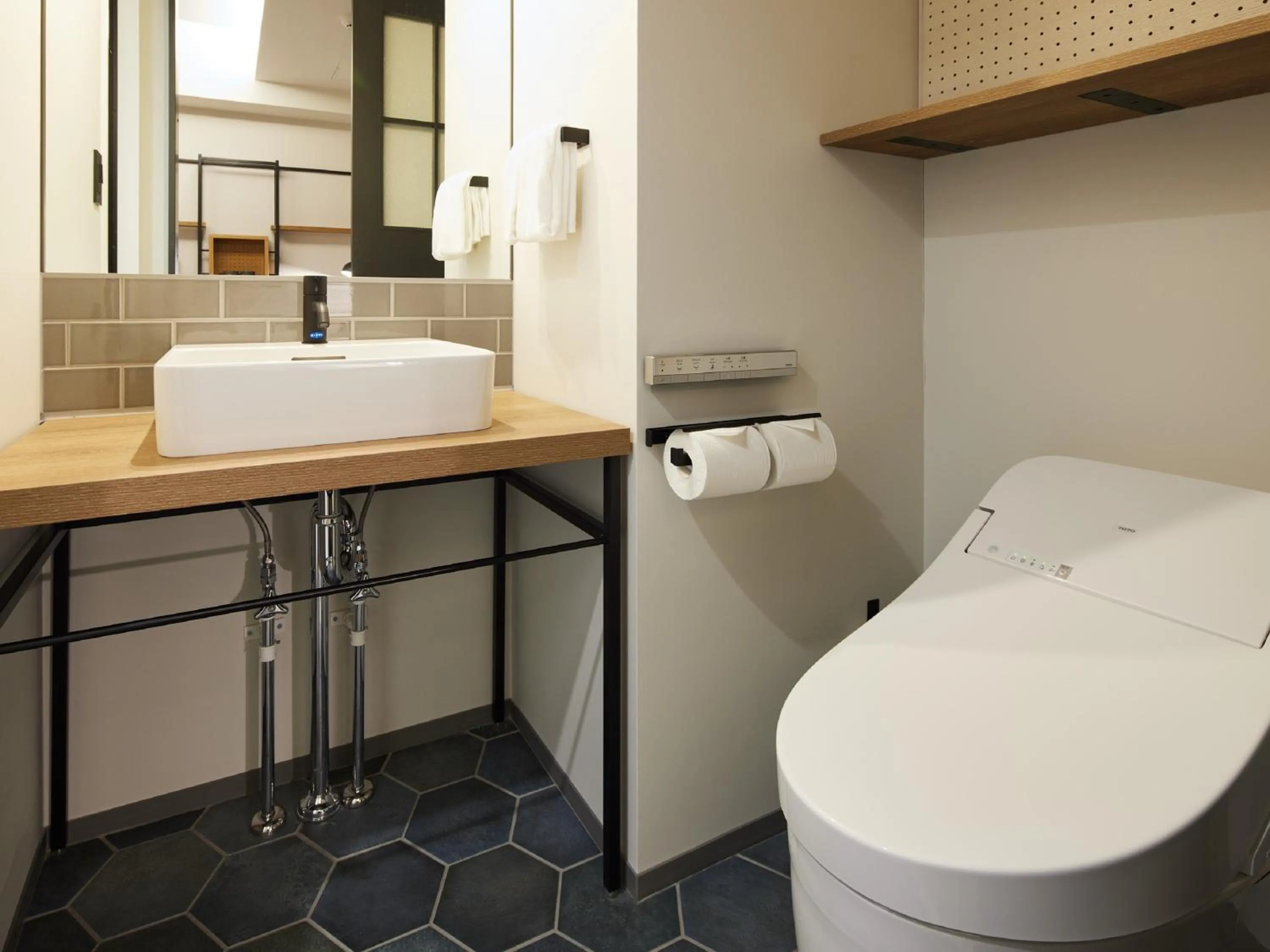 Toilet in LAMP LIGHT BOOKS HOTEL fukuoka