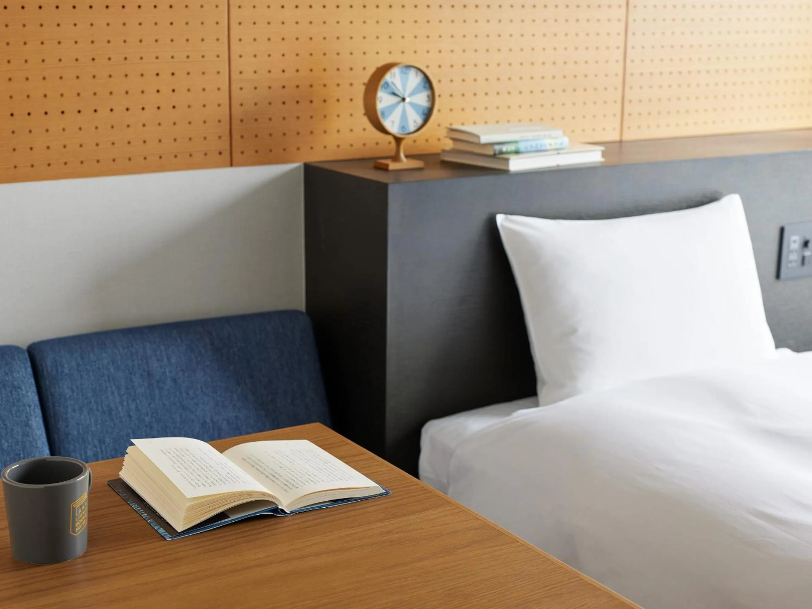 Living room, Bed in LAMP LIGHT BOOKS HOTEL fukuoka