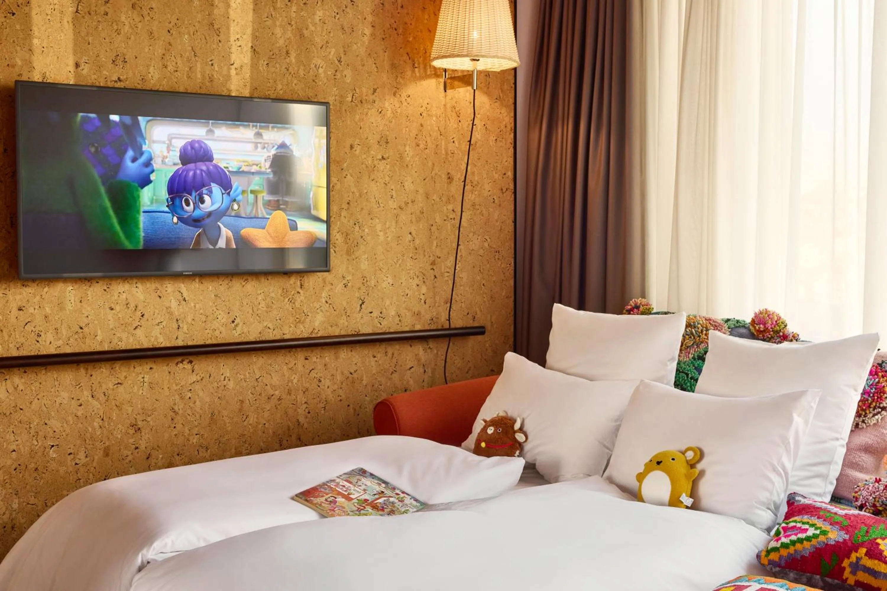 Communal lounge/ TV room, Bed in Mama Shelter Prague