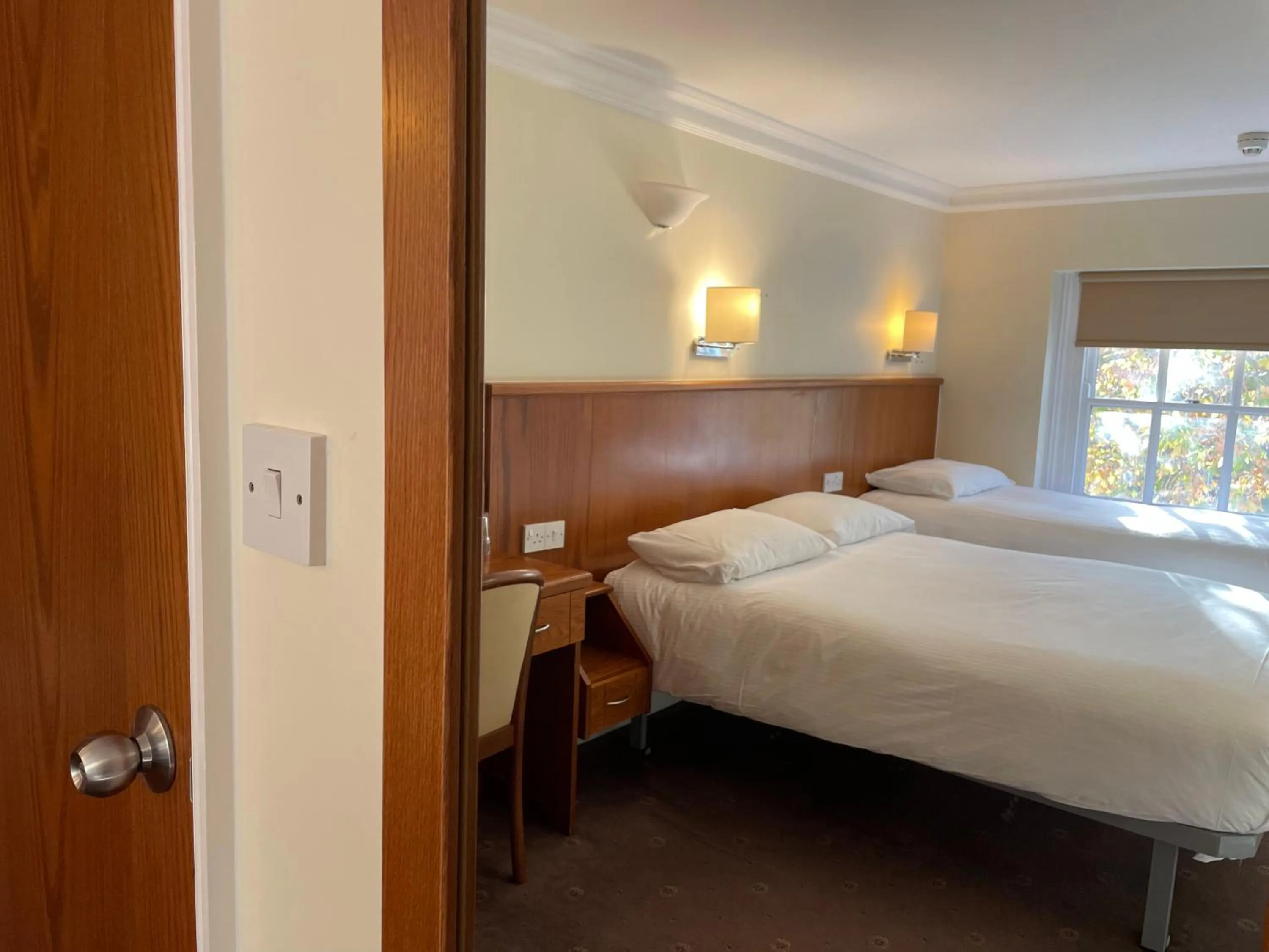 Bed in Orchard Hotel