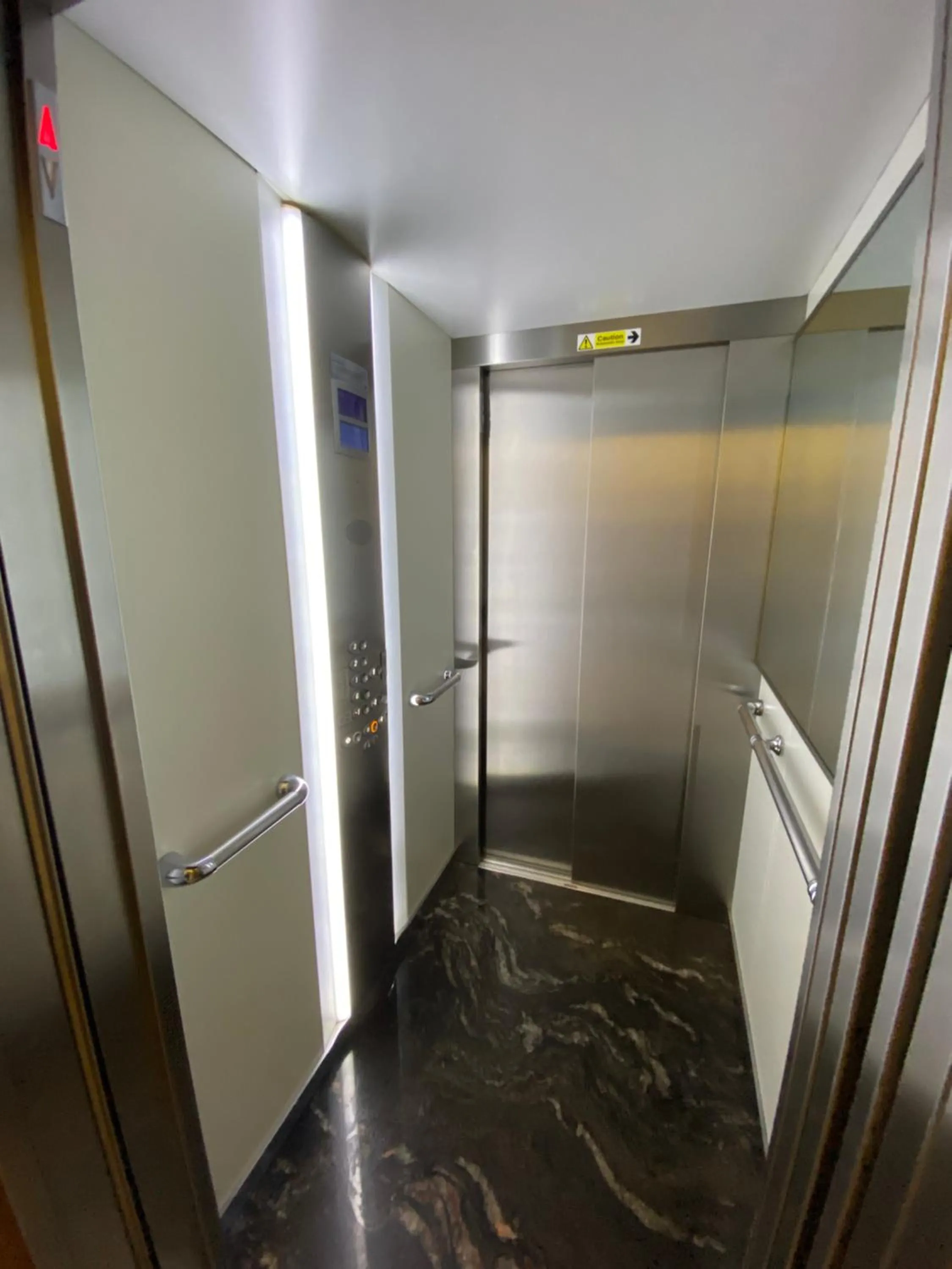 elevator in Orchard Hotel