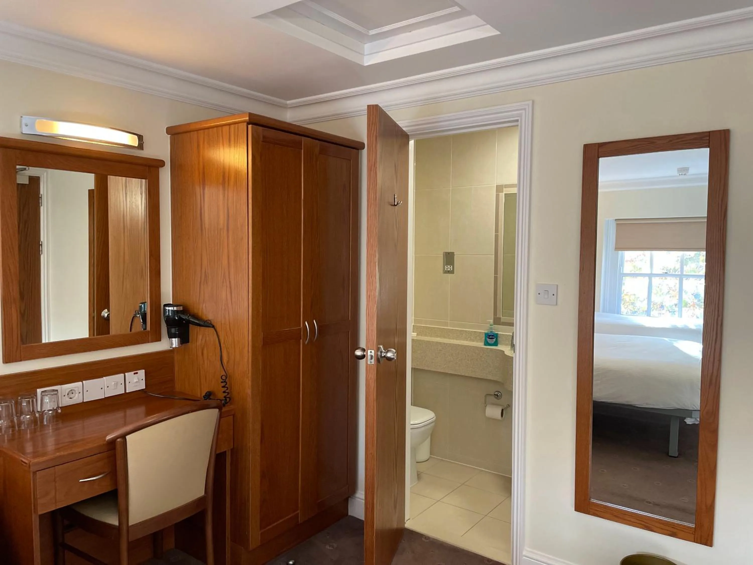 Bathroom, Bed in Orchard Hotel