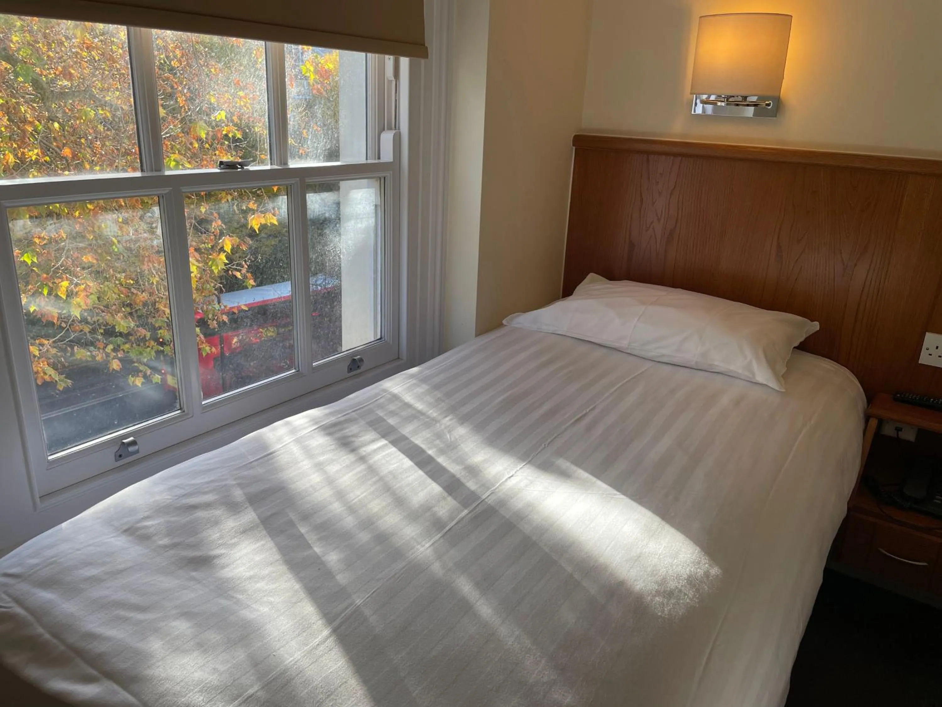 Bed in Orchard Hotel