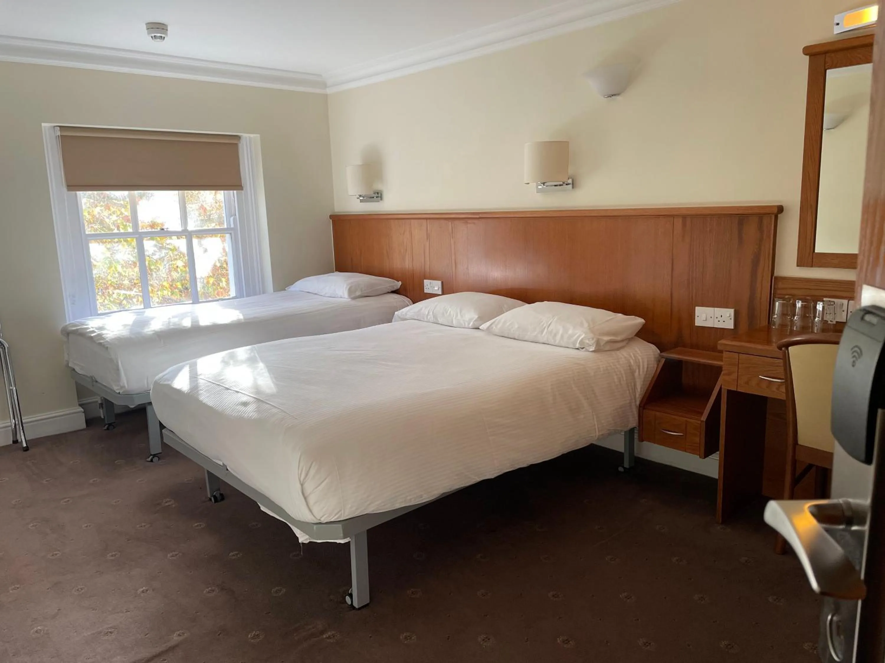 Bed in Orchard Hotel