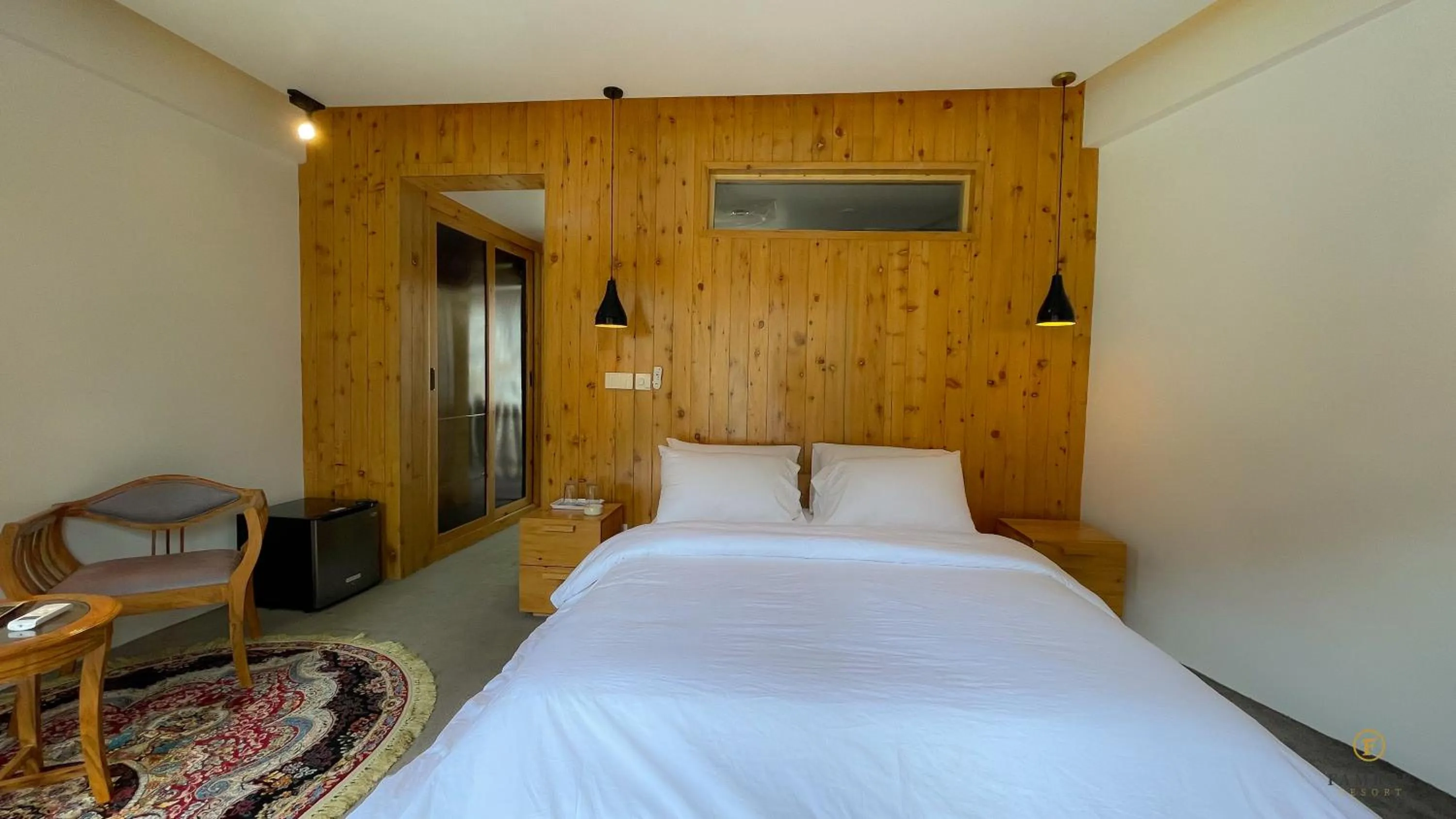 Photo of the whole room, Bed in Famree Resort Hunza