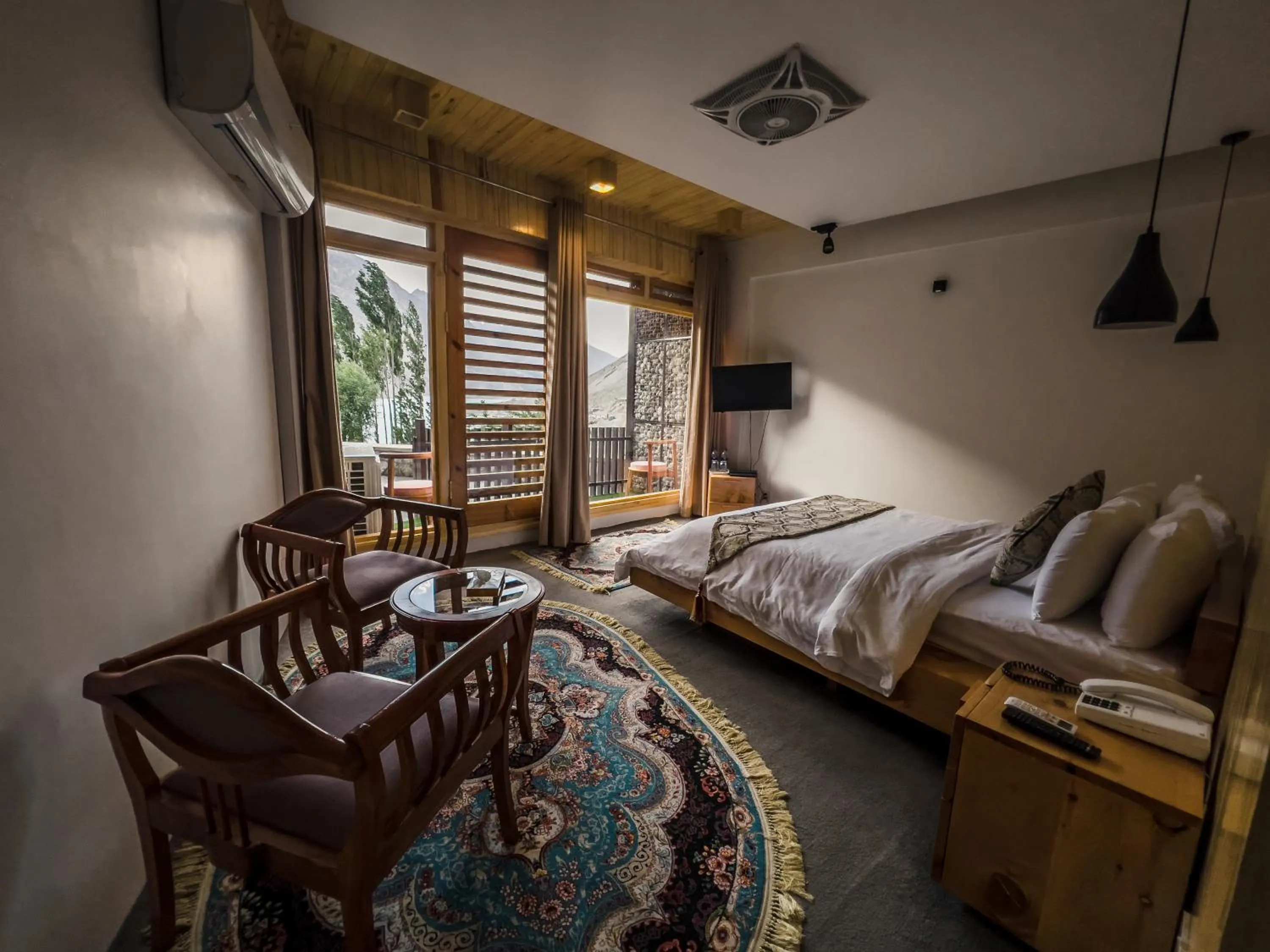 Photo of the whole room, Bed in Famree Resort Hunza