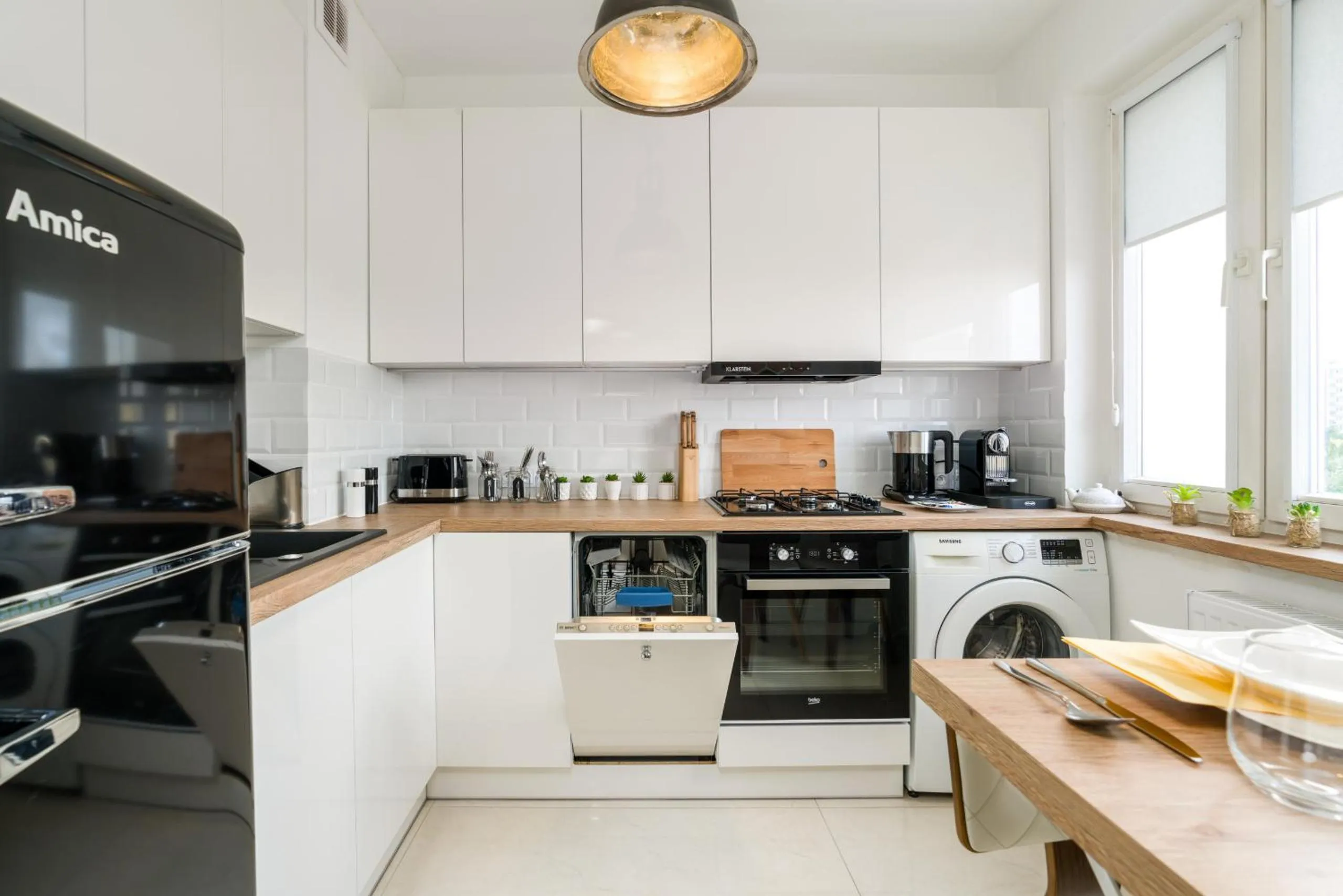 Kitchen or kitchenette in Apartments Poznań Keplera by Noclegi Renters