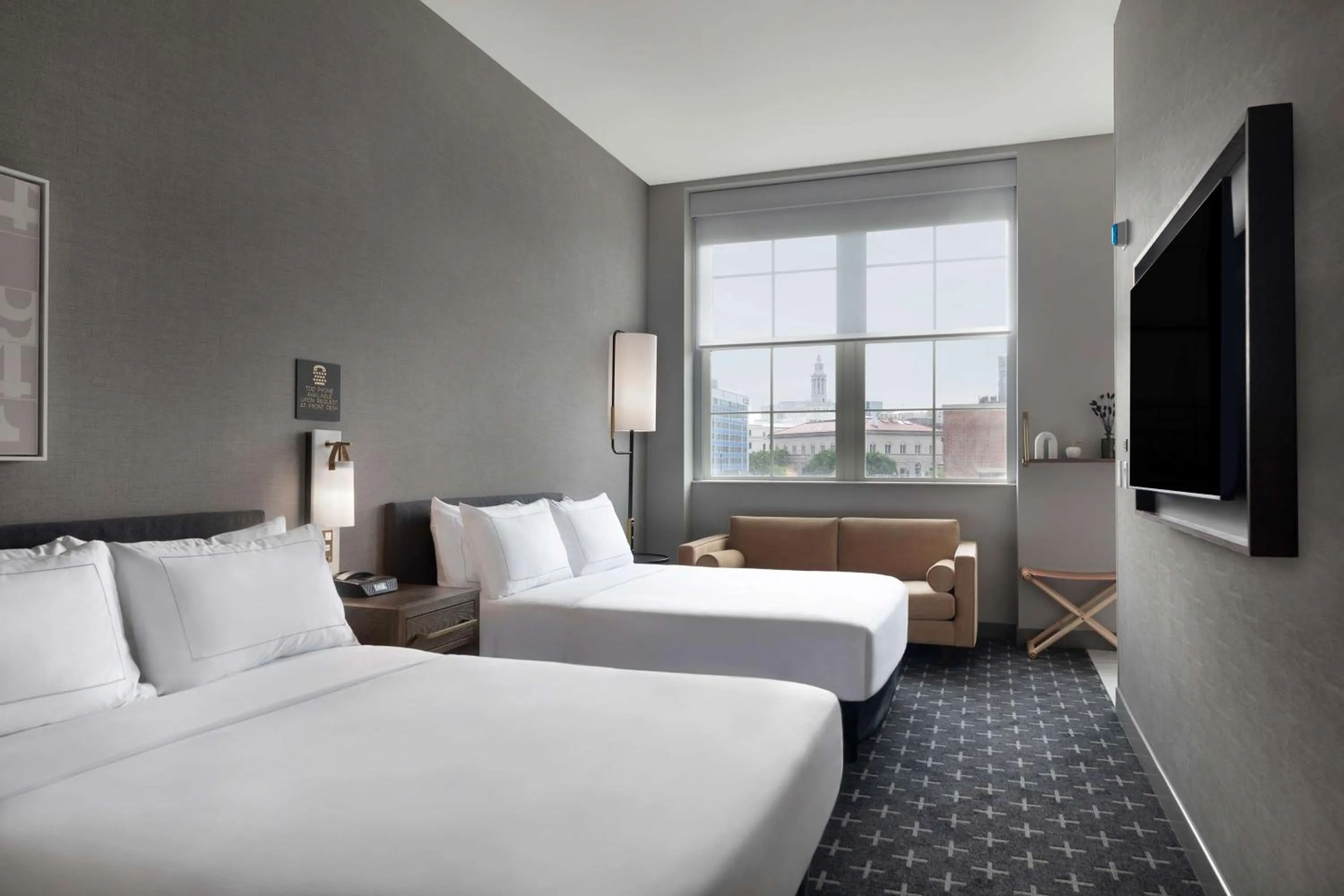 Living room, Bed in The Slate Hotel Denver Downtown, Tapestry by Hilton