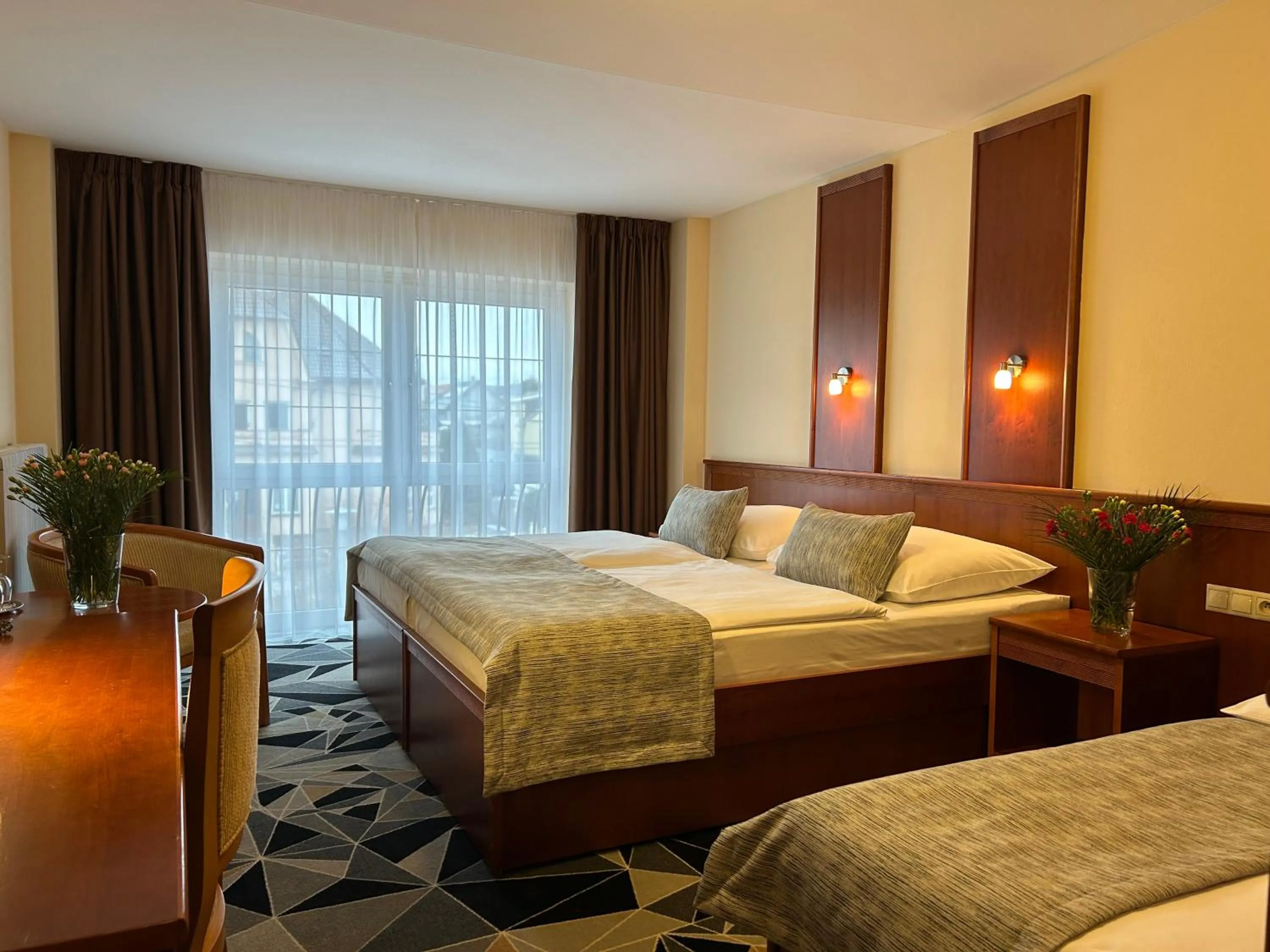 Bed in PRIMAVERA Hotel & Congress centre