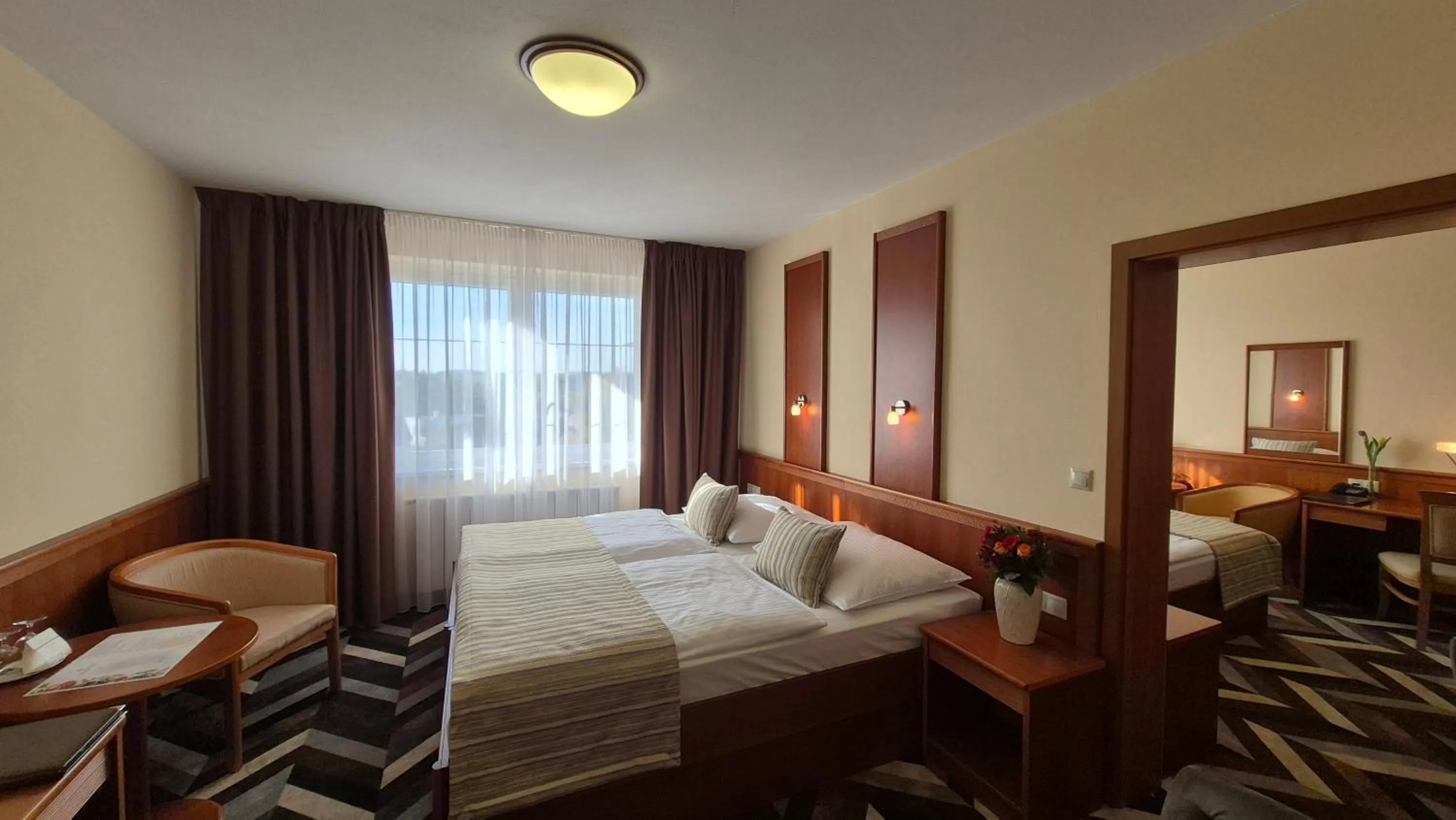 Bed in PRIMAVERA Hotel & Congress centre