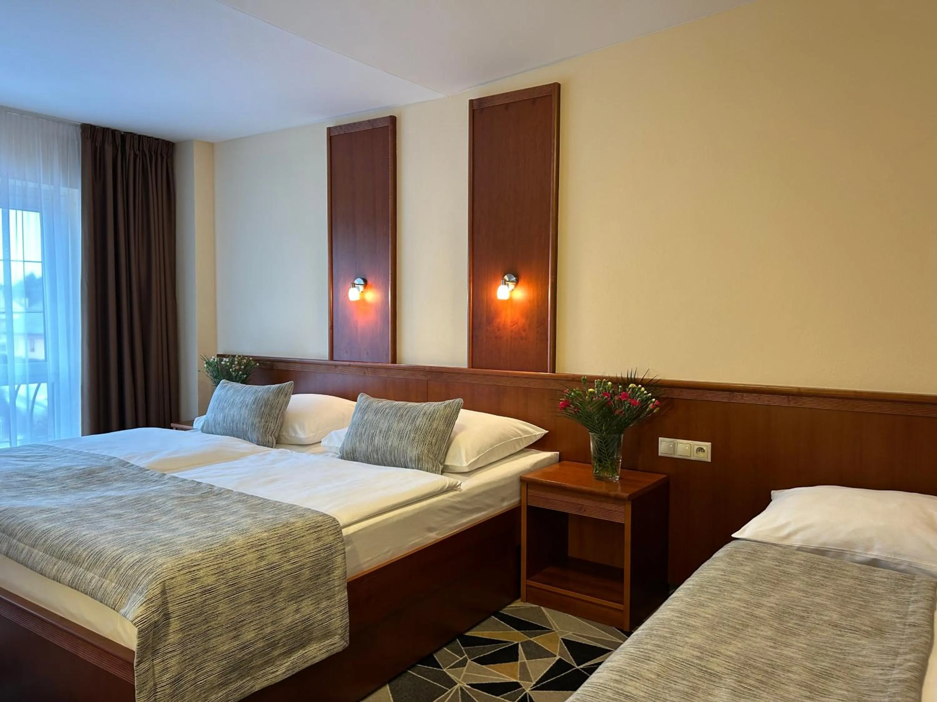 Bed in PRIMAVERA Hotel & Congress centre