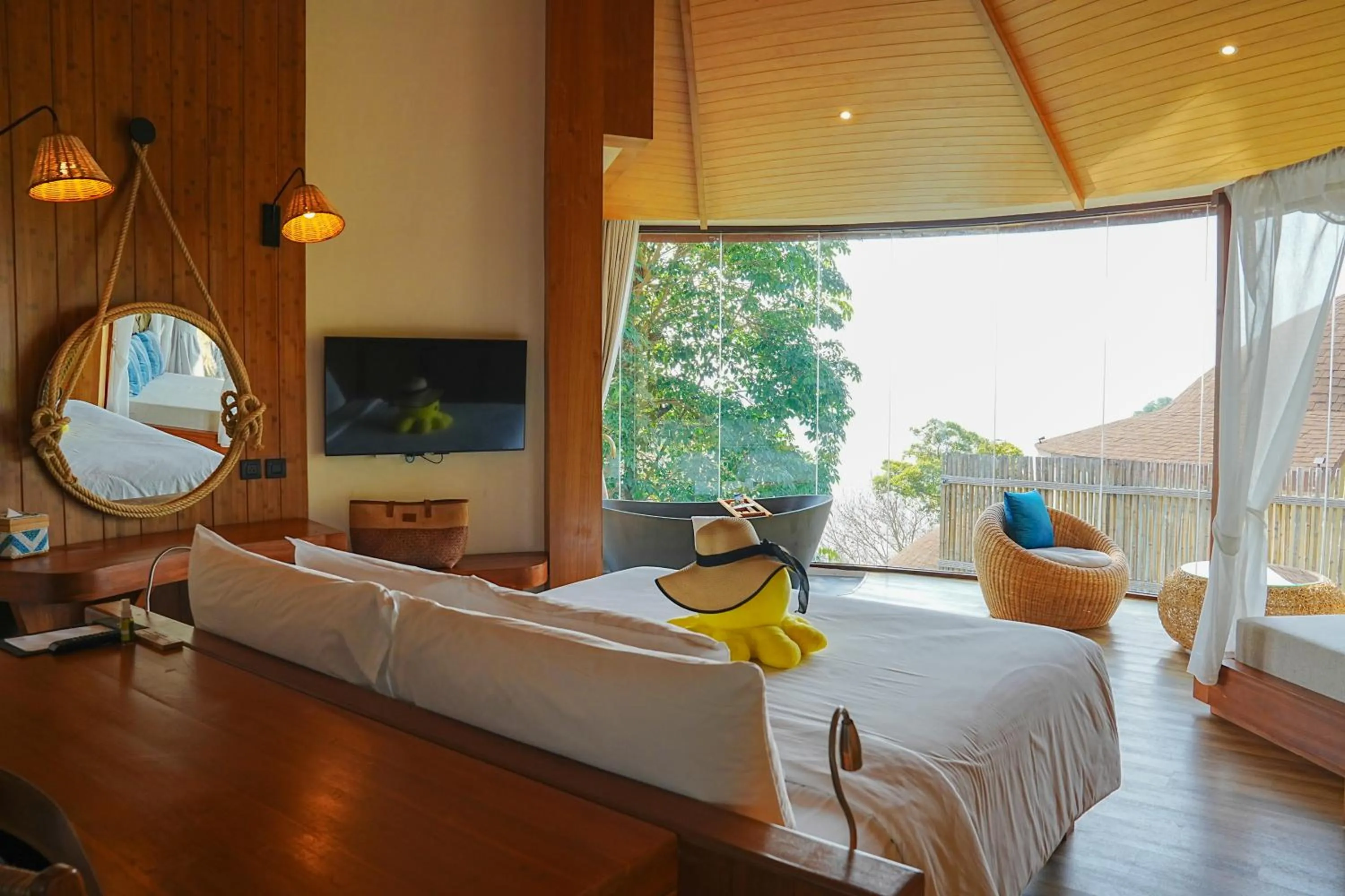 Bed in SINAE Phuket Luxury Hotel