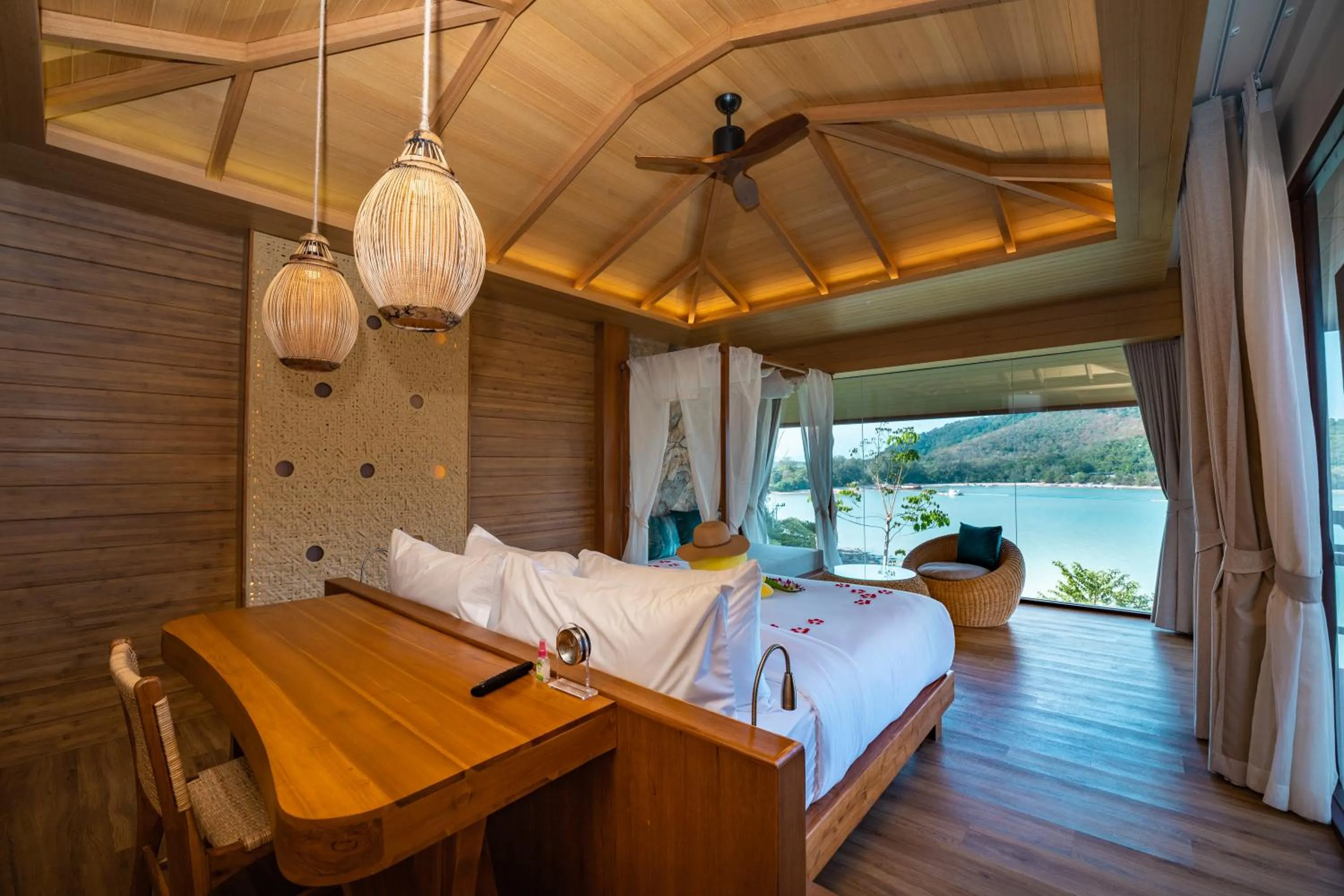 Bed in SINAE Phuket Luxury Hotel