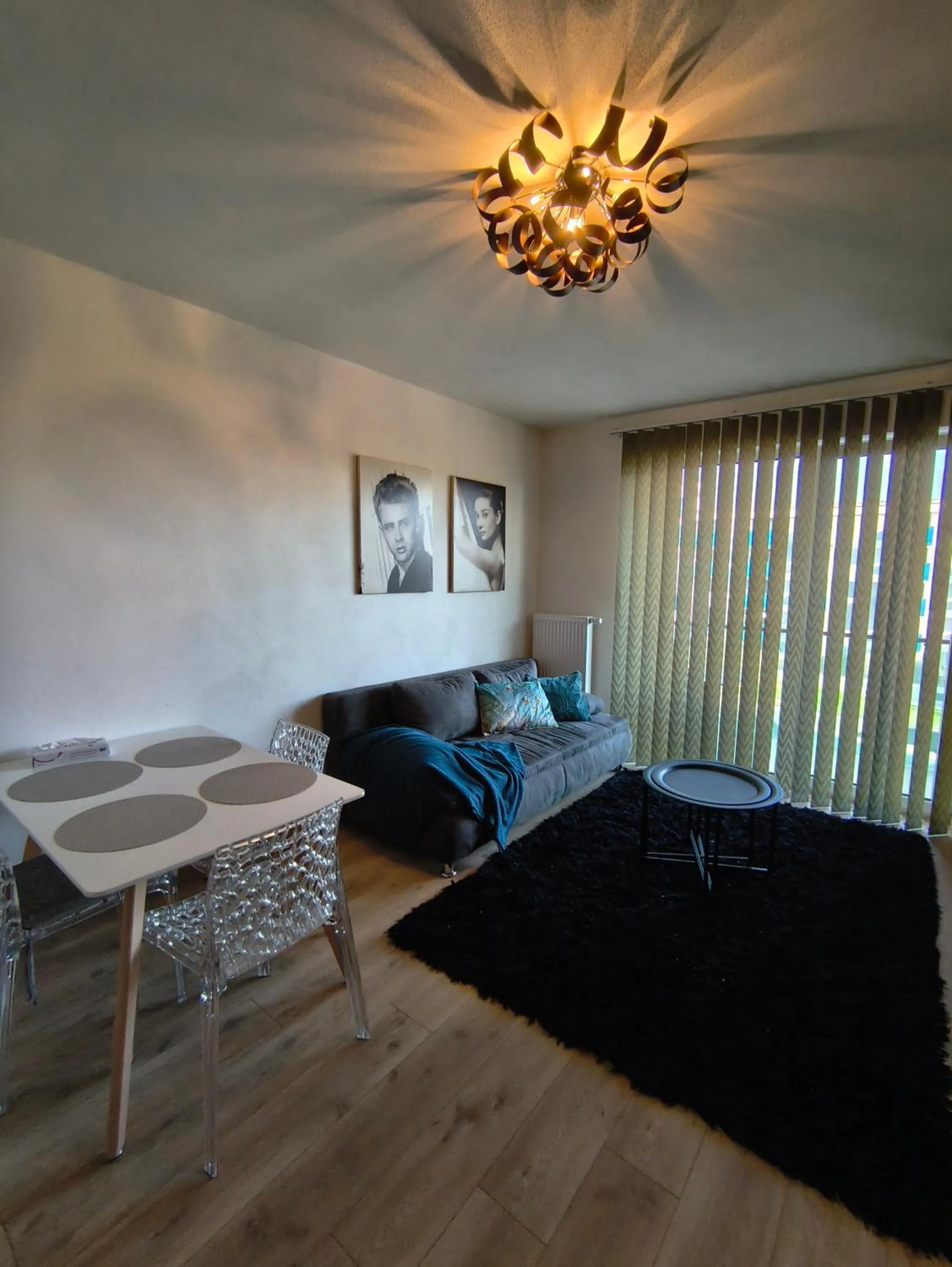 Living room, Bed in Hotel Plzeň