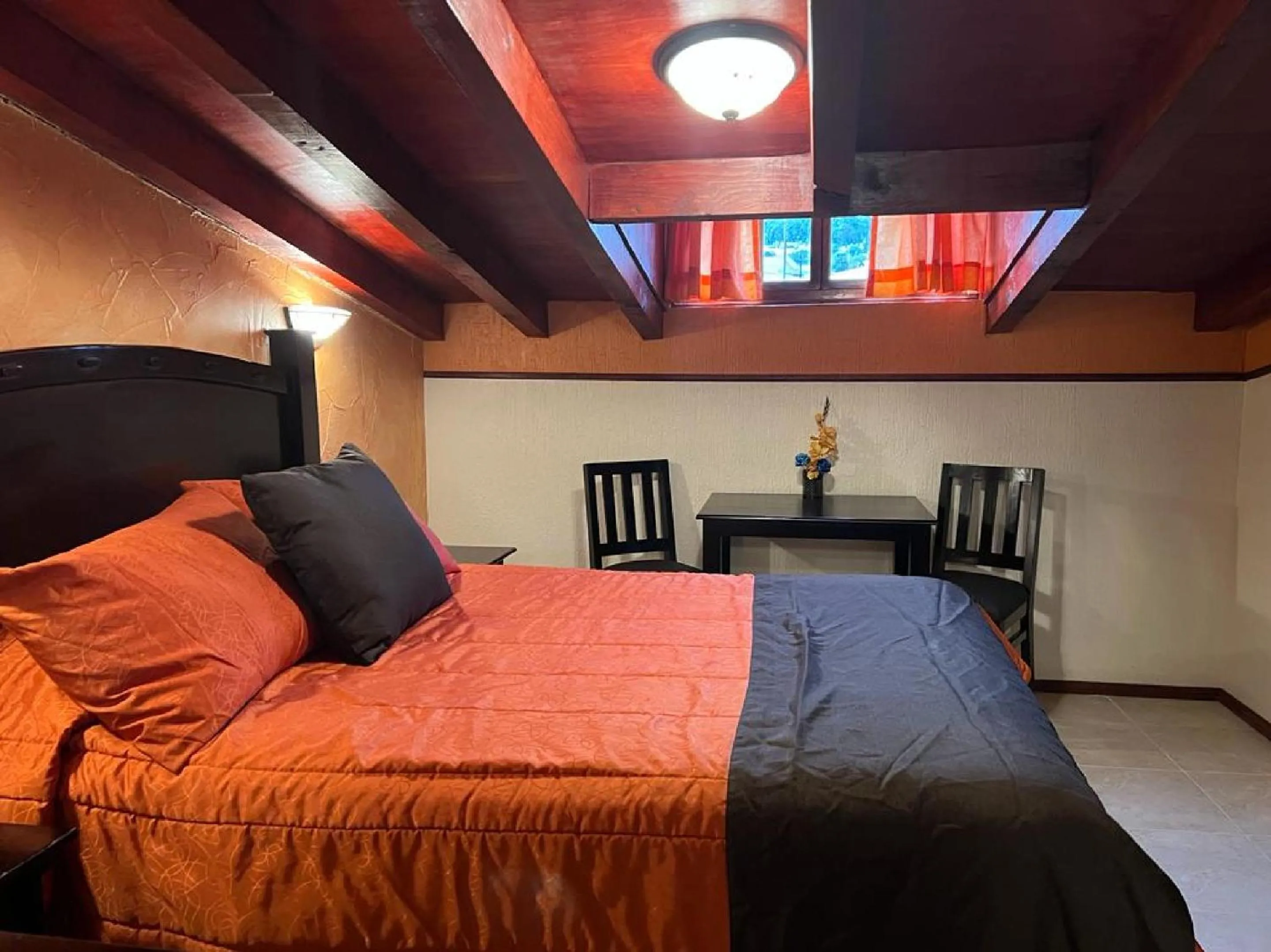 Bed in Hotel Paraiso Real Plus