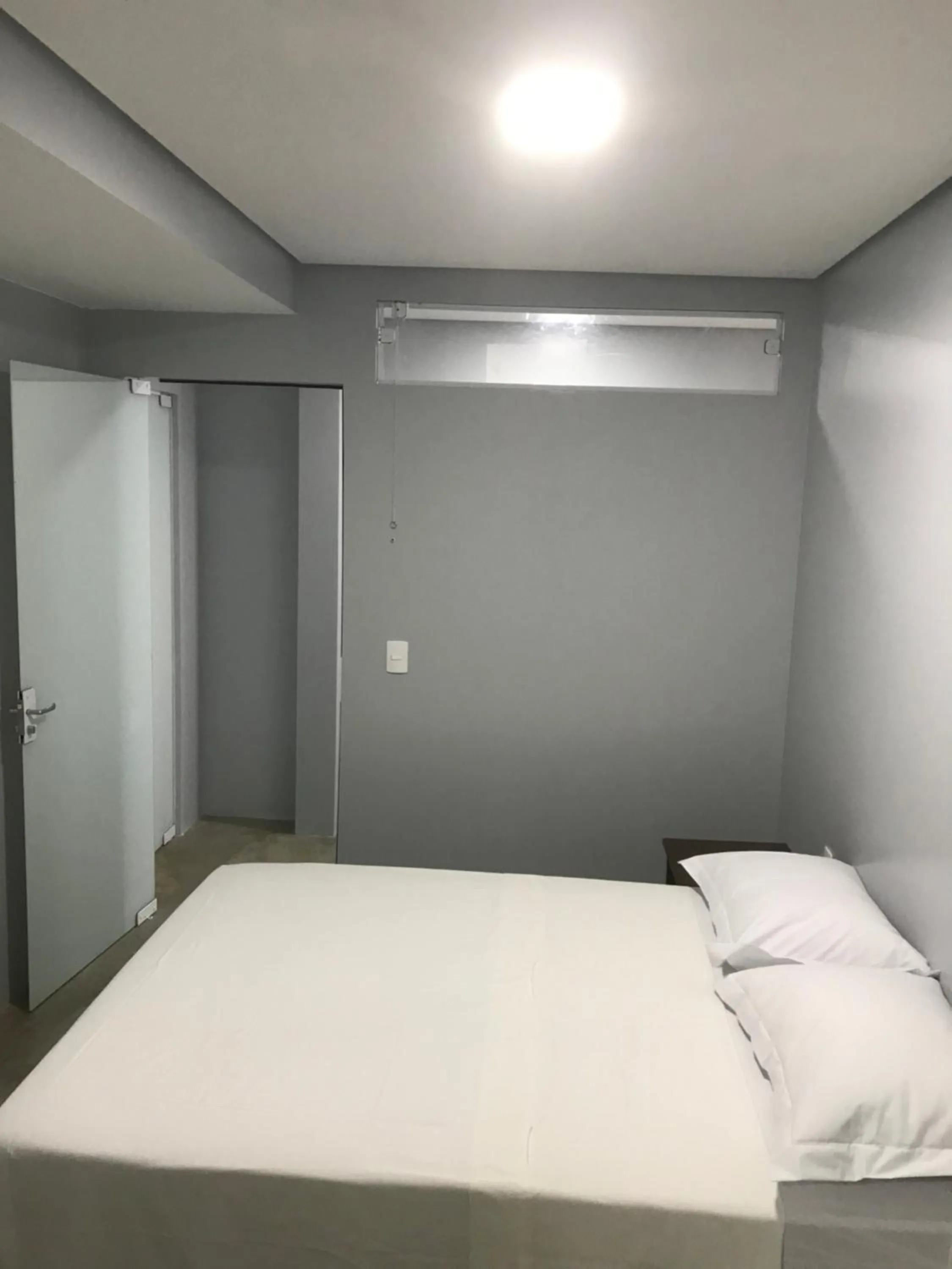 Bed in Pousada Ohana Dullius