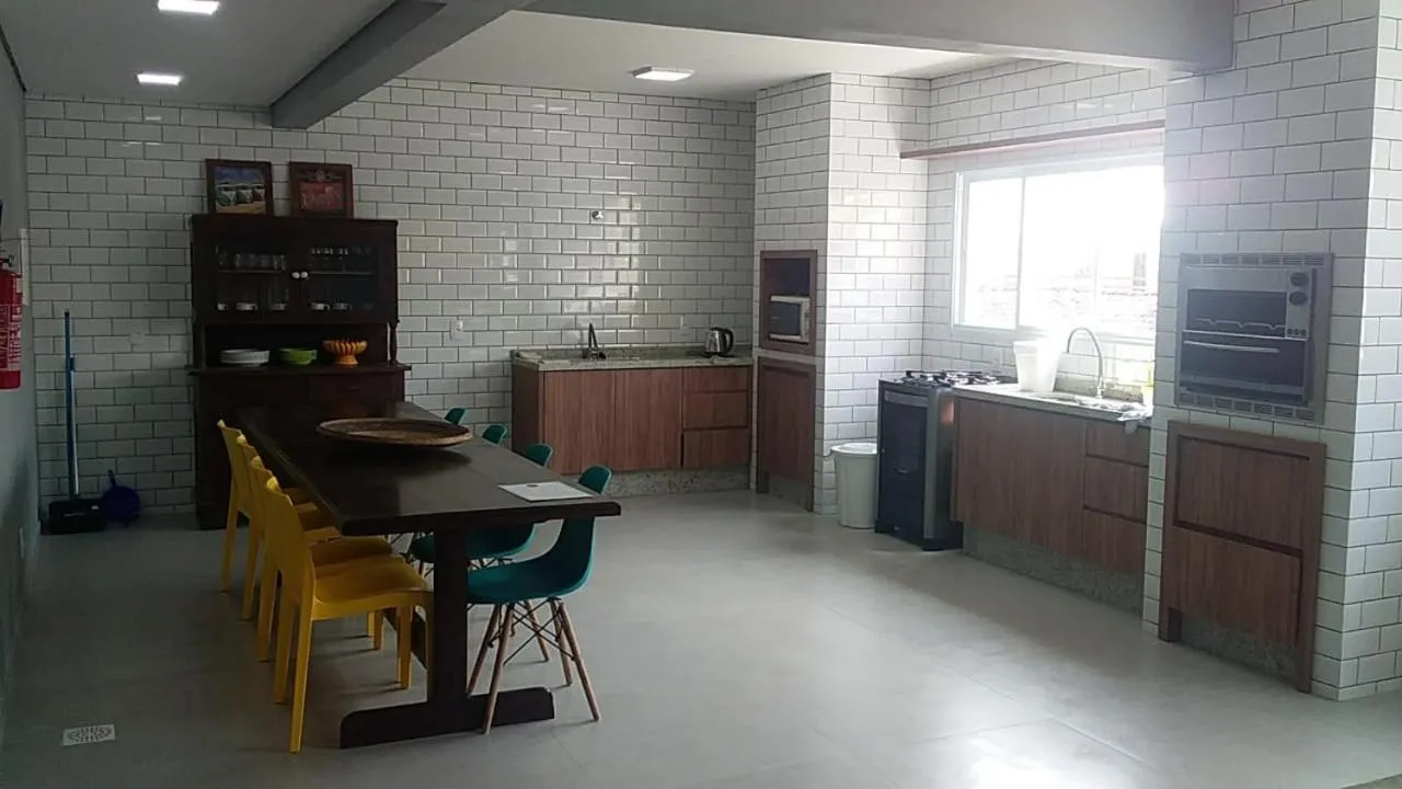 Kitchen or kitchenette in Pousada Ohana Dullius