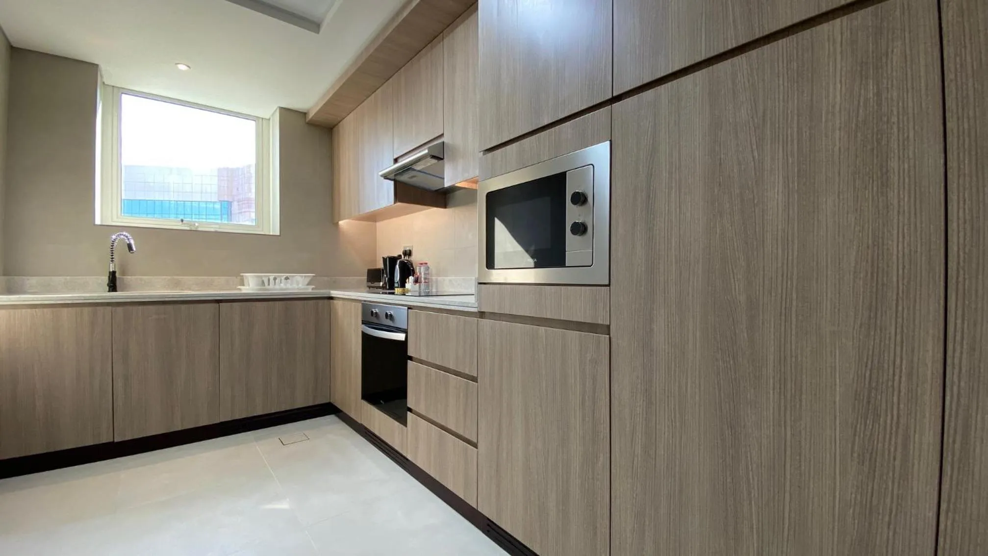 Kitchen or kitchenette in SITARA HOTEL APARTMENT