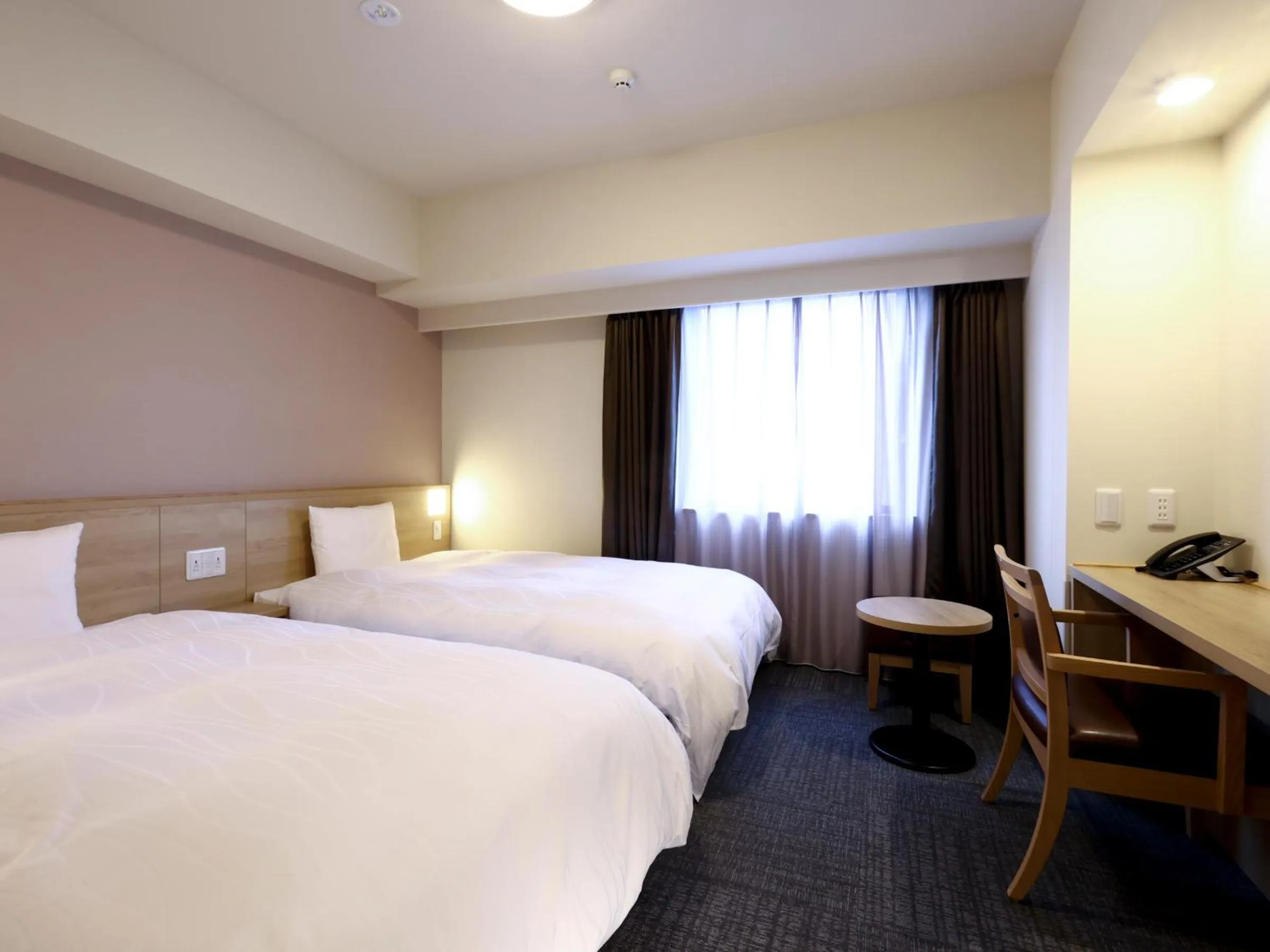 Bed in Dormy Inn Hiroshima Annex