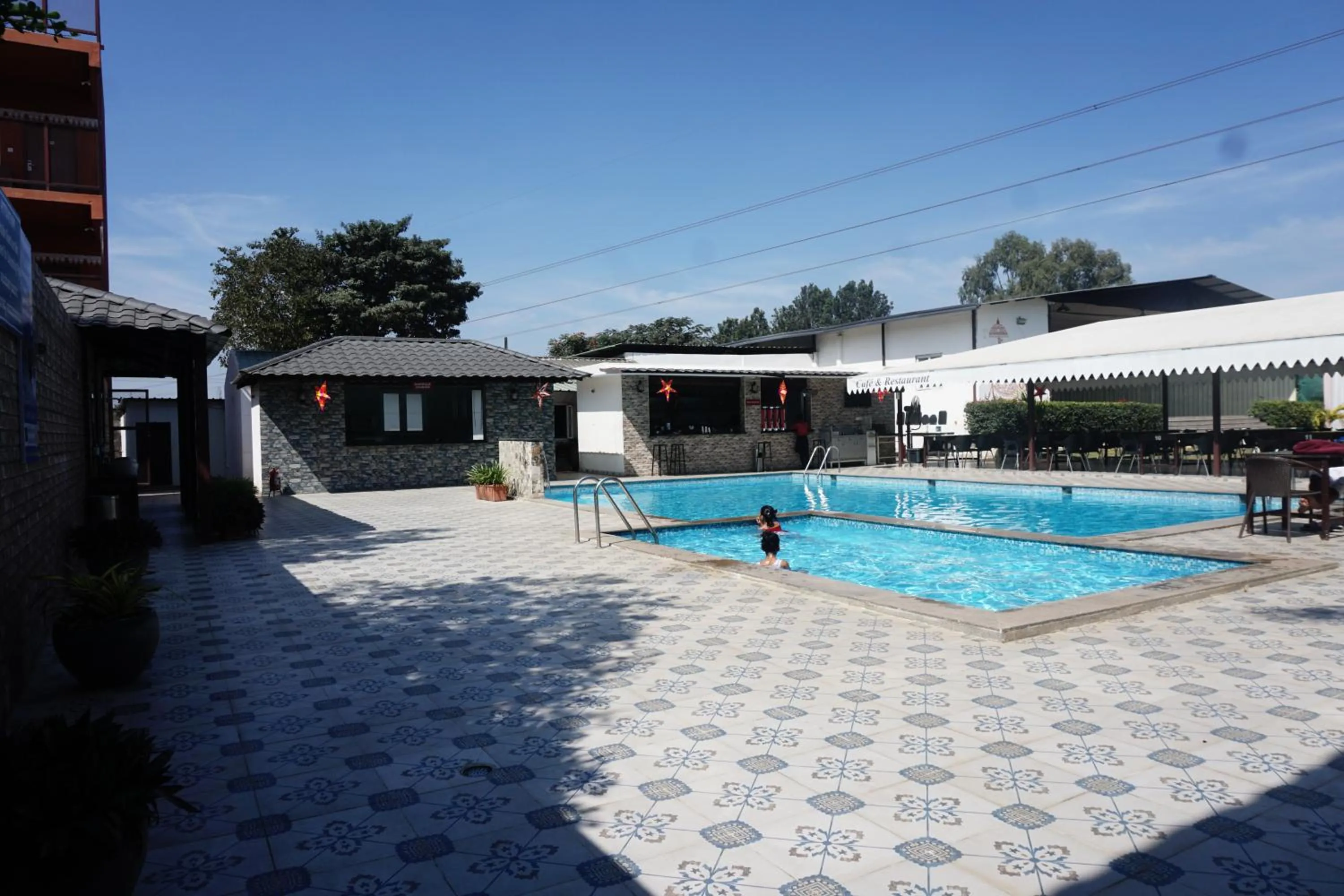 Swimming pool in Vistar Resort & Hotels