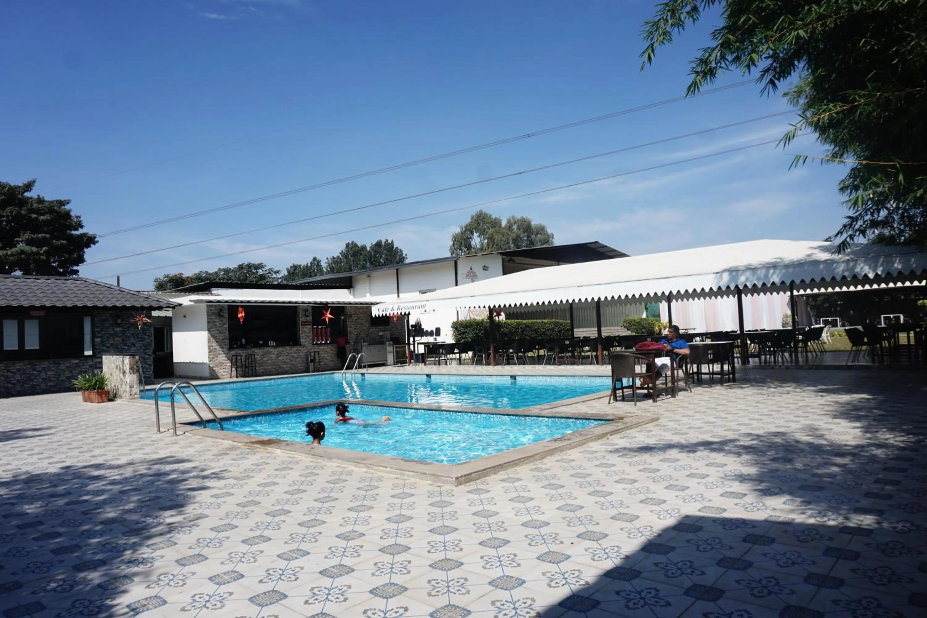 Swimming pool in Vistar Resort & Hotels