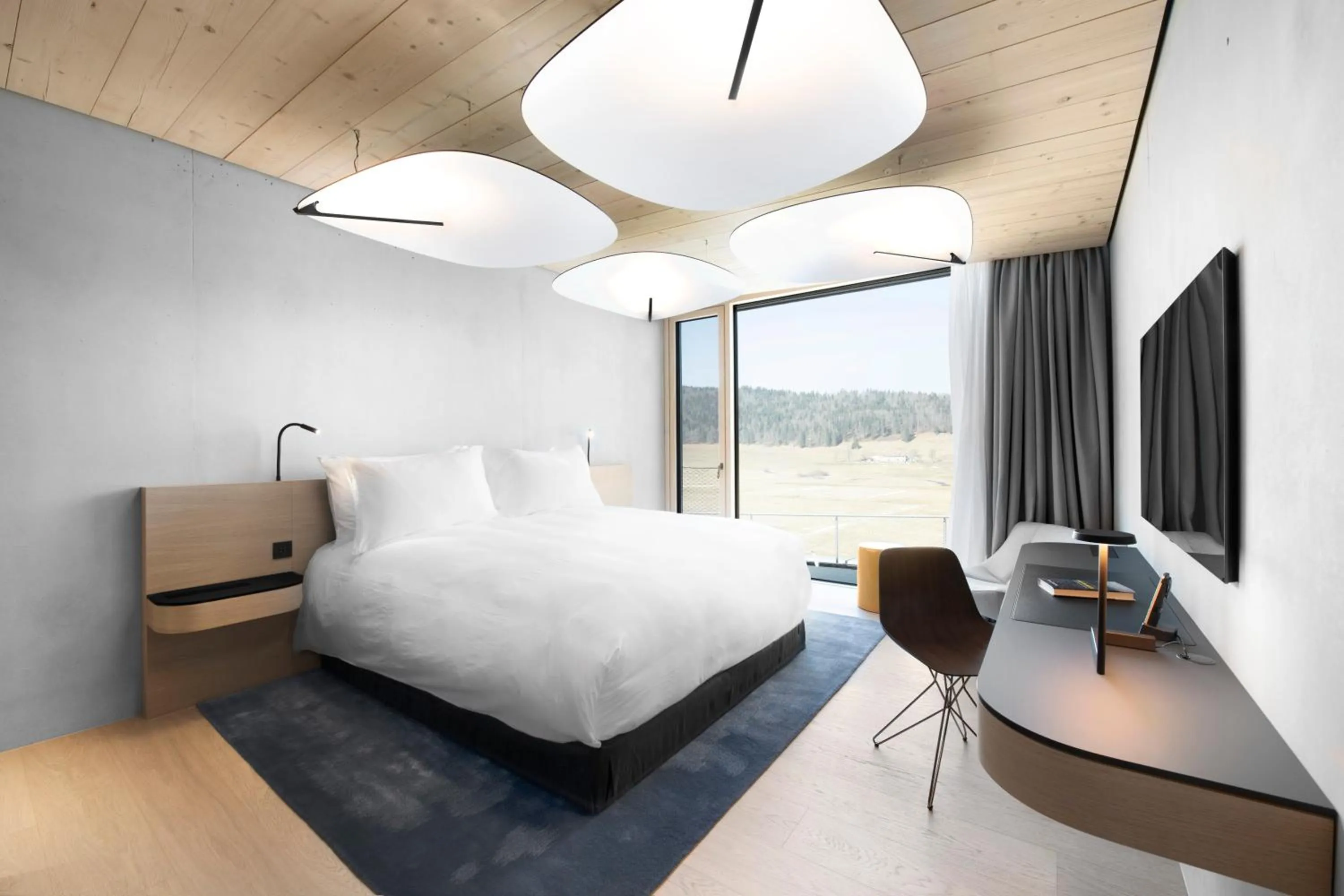 Photo of the whole room, Bed in Hôtel des Horlogers