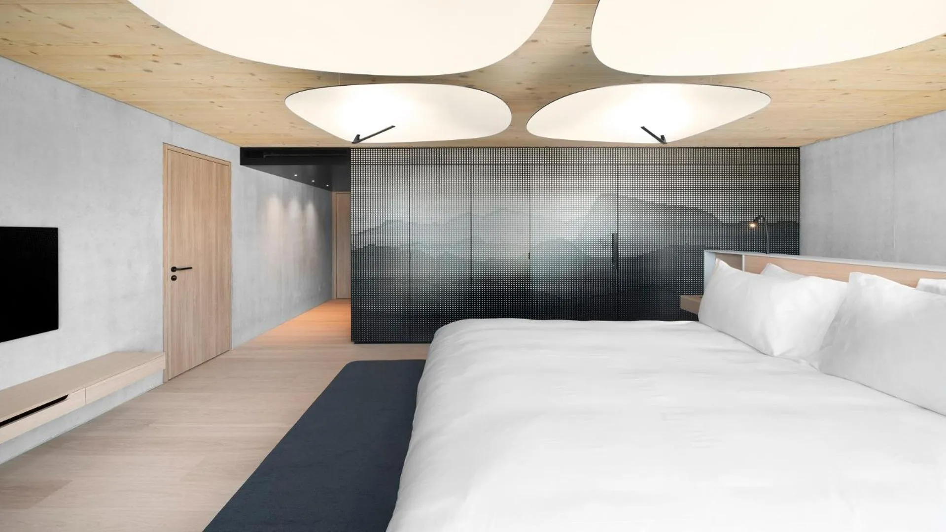 Photo of the whole room, Bed in Hôtel des Horlogers