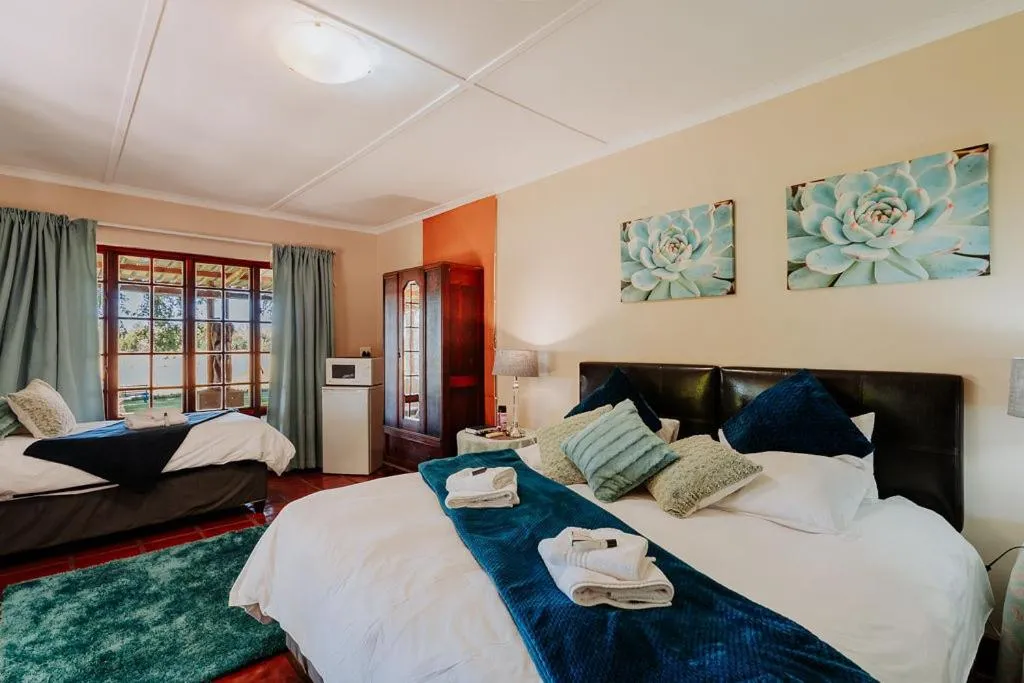 Bed in Riverbank Lodge