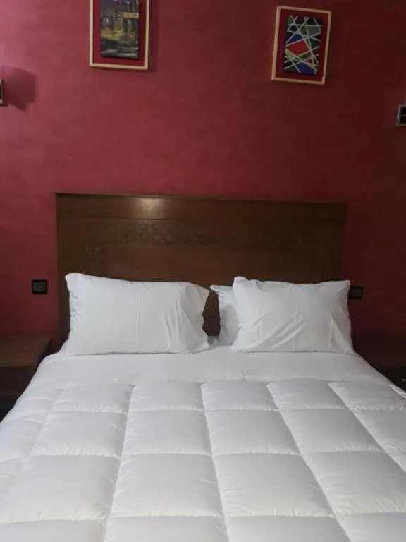 Bed in Amor Hotel
