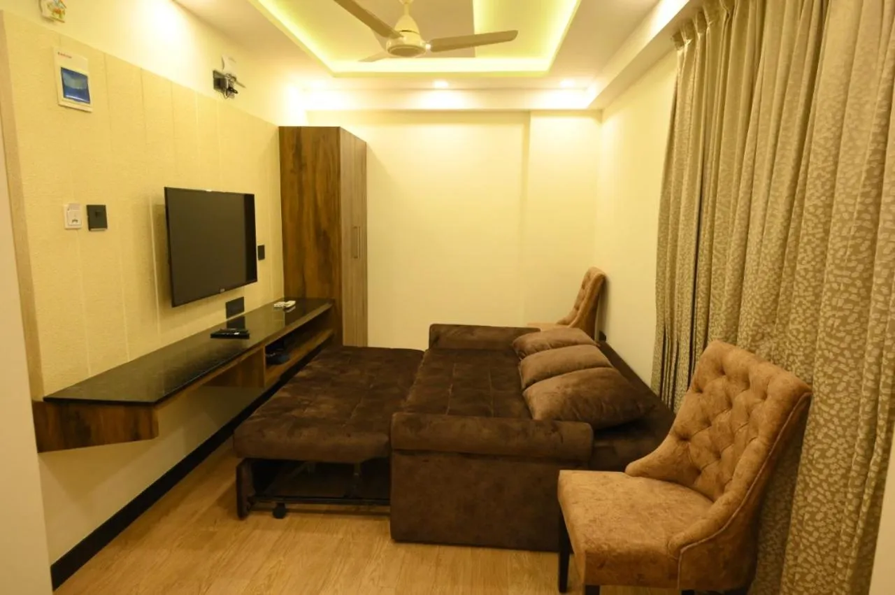 Living room in Meenakshi Inn