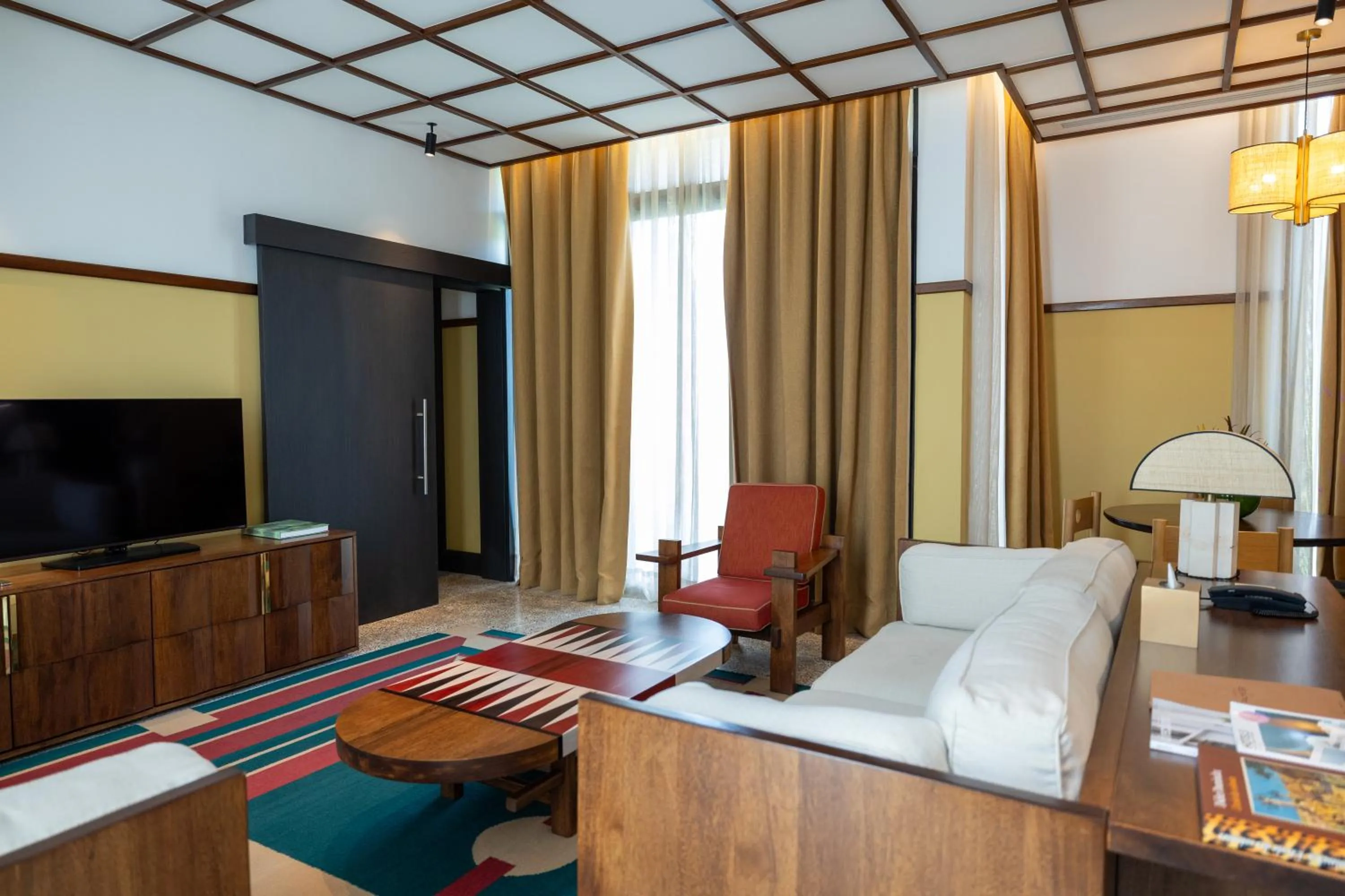 Seating area, Bed in La Maison Palmier Abidjan, a Member of Design Hotels