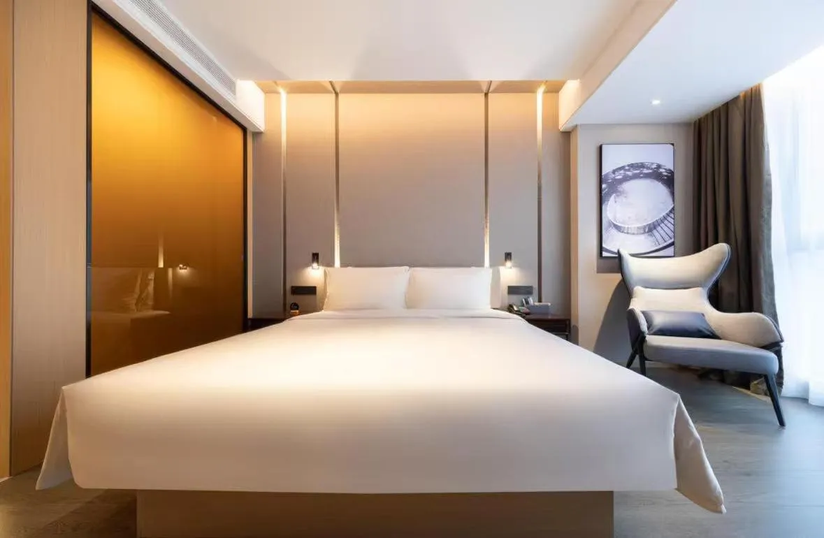 Bed in Atour Hotel Ningbo Fenghua Huizheng Street