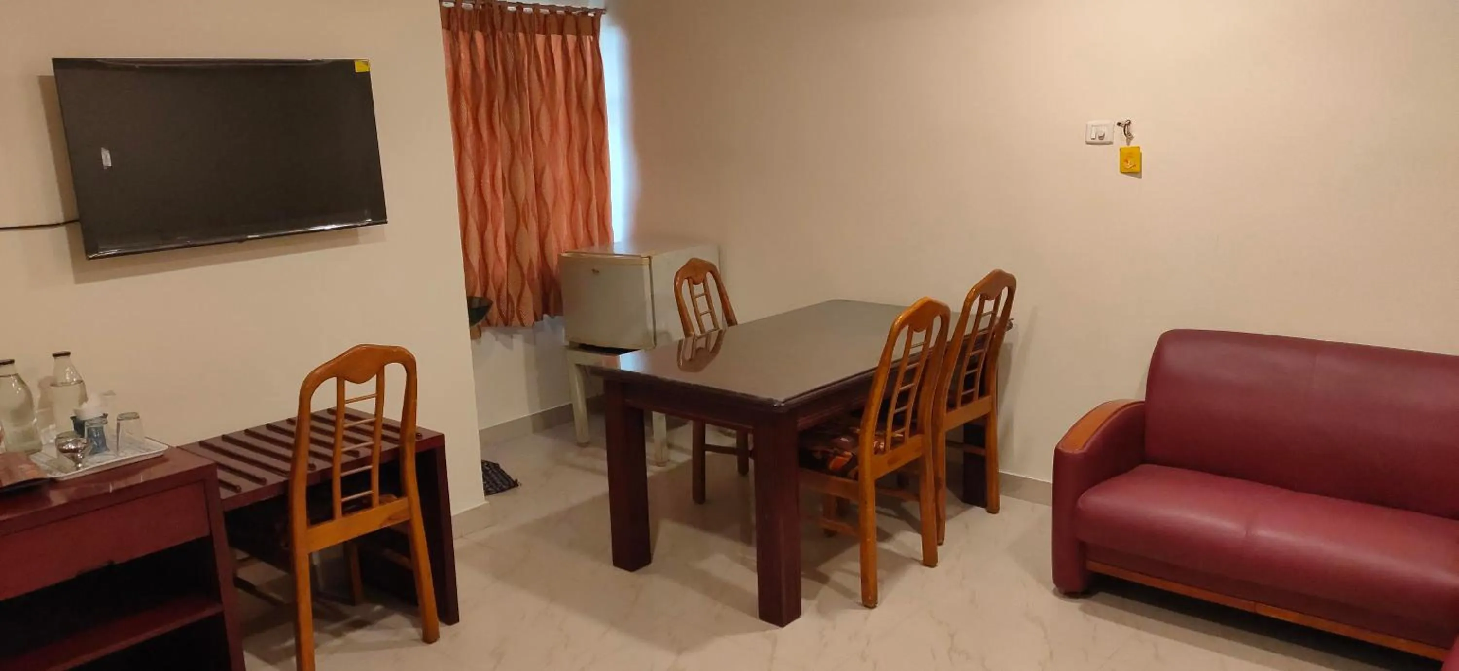 Seating area in Hotel Geetha International