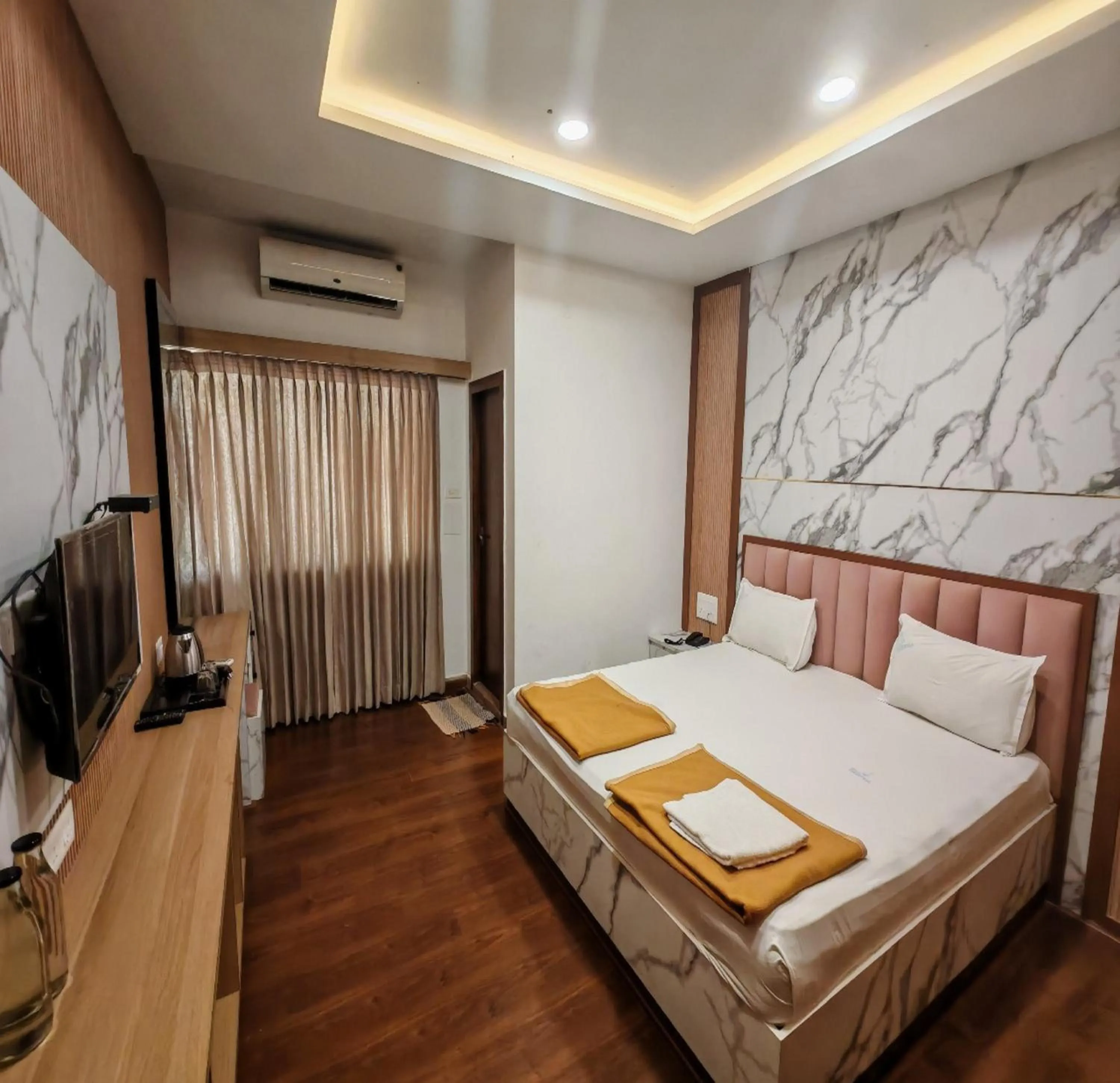 Photo of the whole room, Bed in Hotel Geetha International