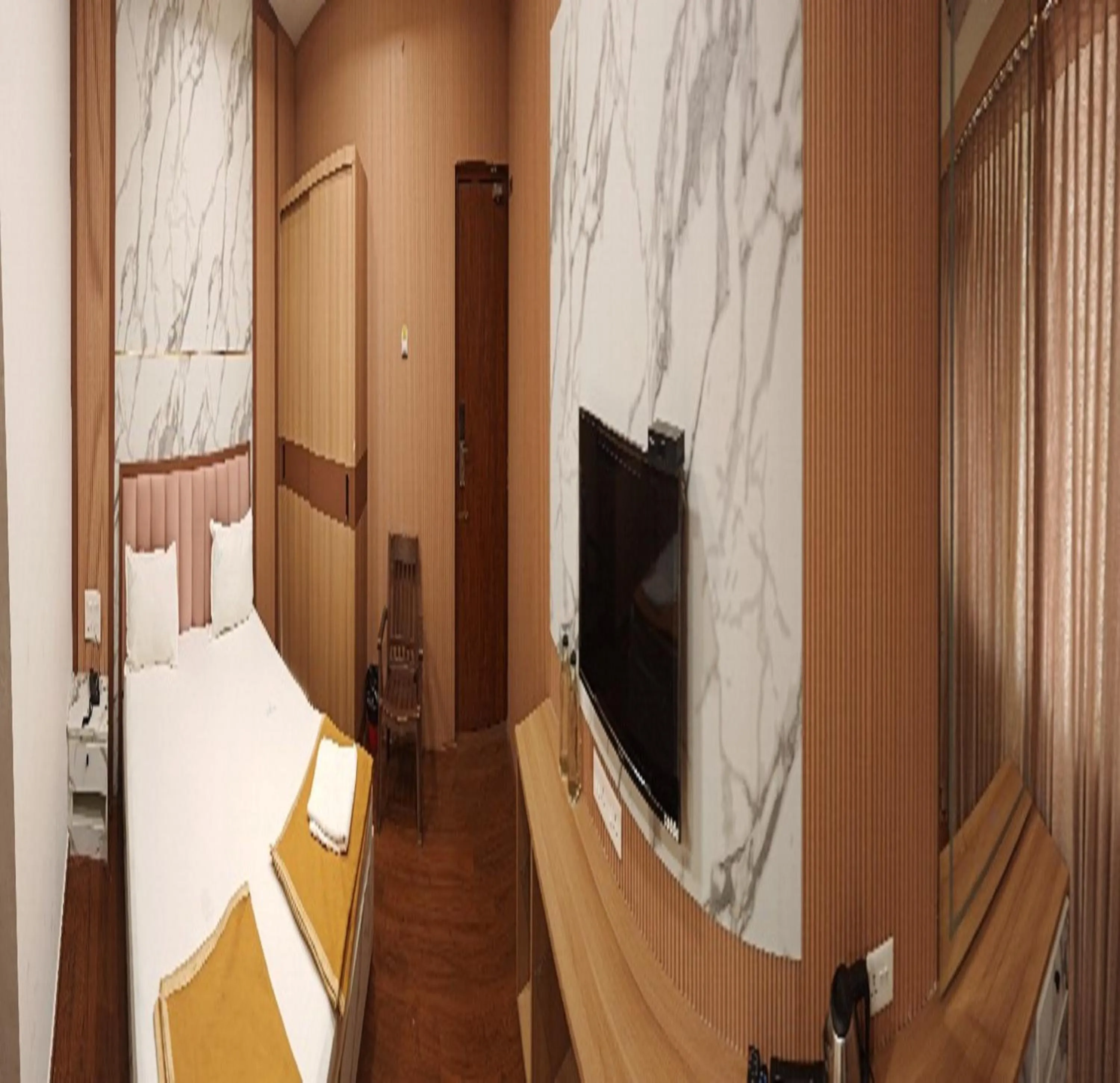 Bedroom in Hotel Geetha International