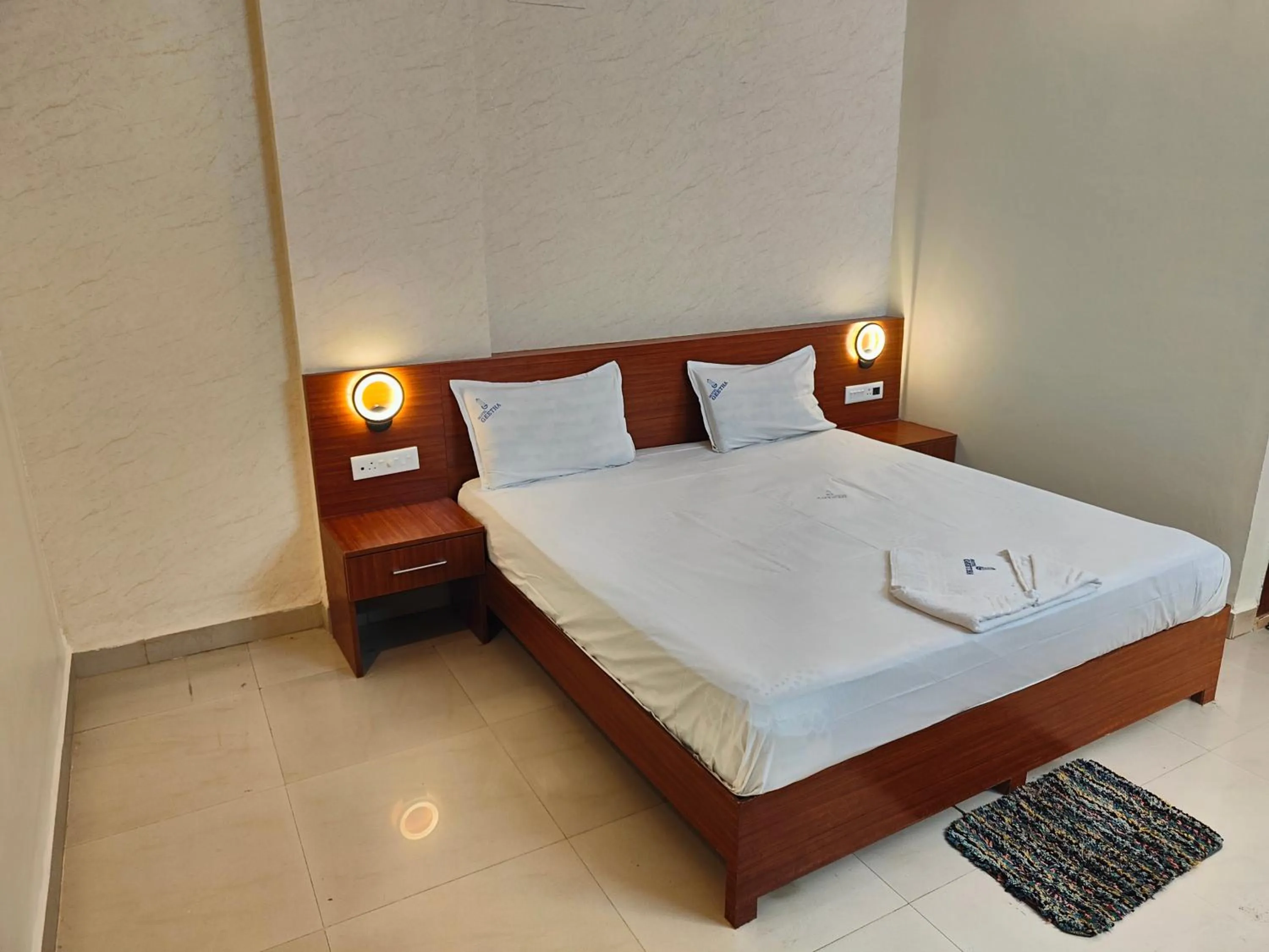 Photo of the whole room, Bed in Hotel Geetha International