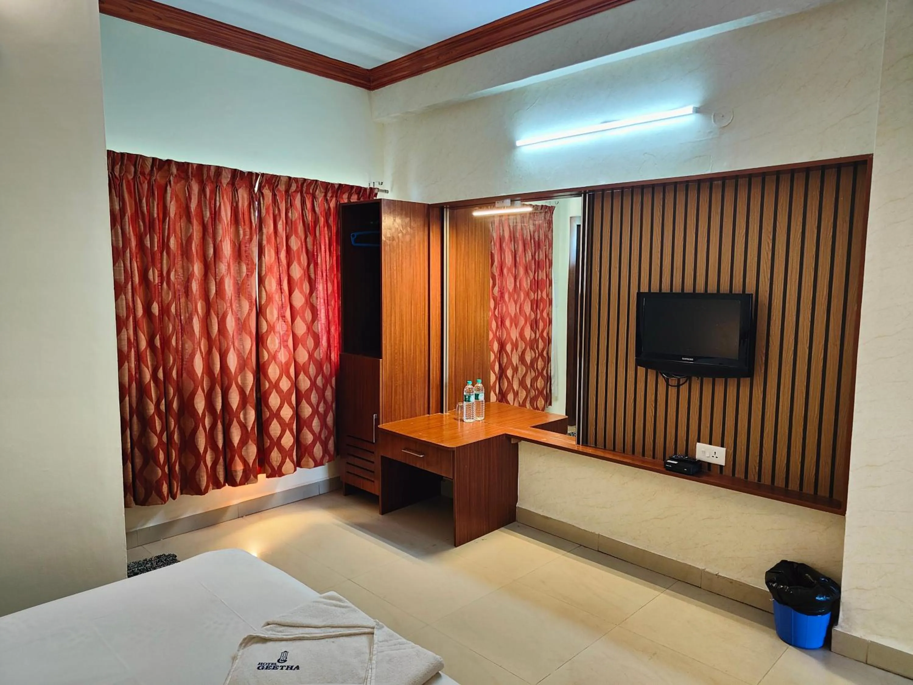 Photo of the whole room, Bed in Hotel Geetha International