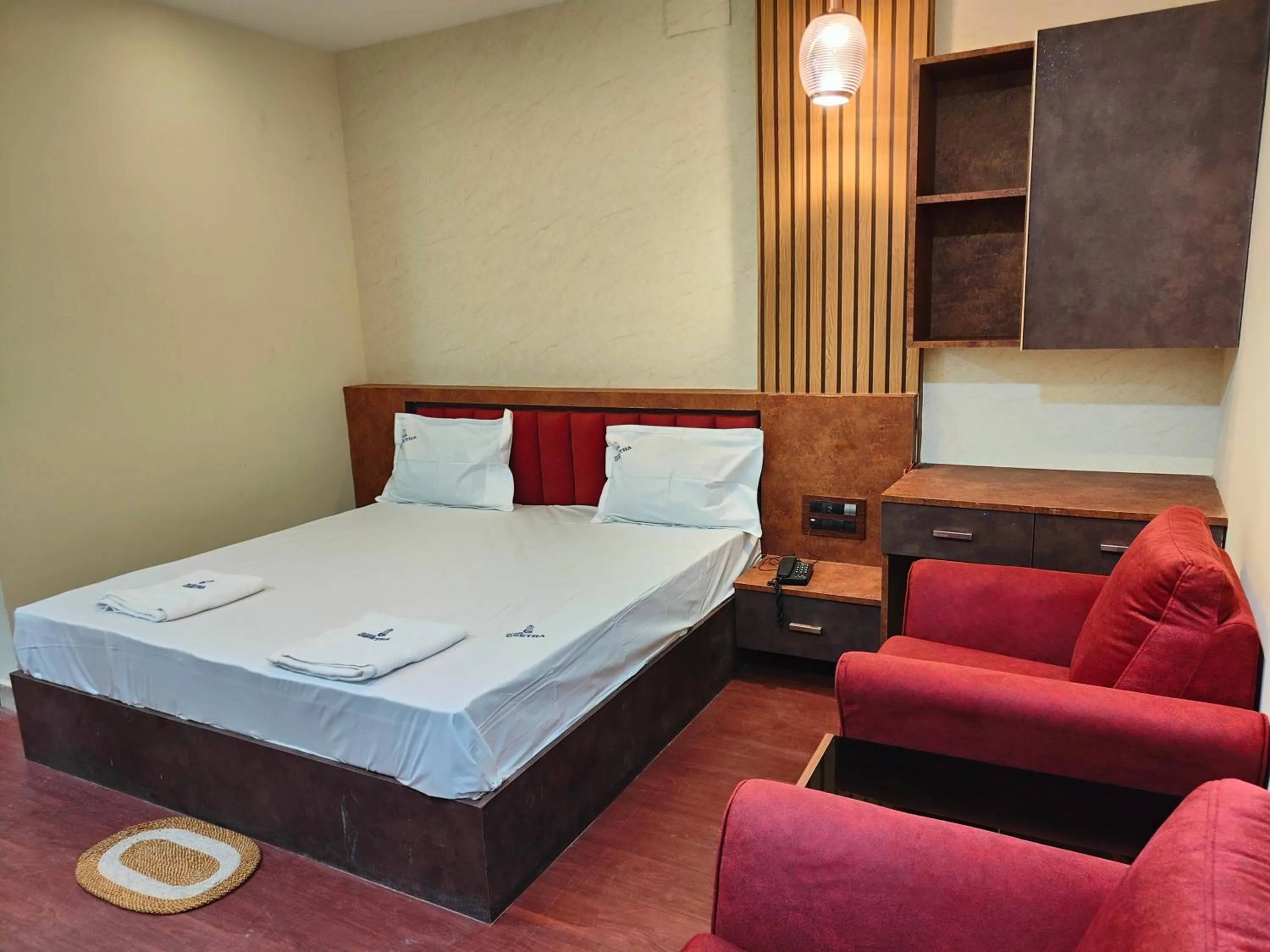 Photo of the whole room, Bed in Hotel Geetha International