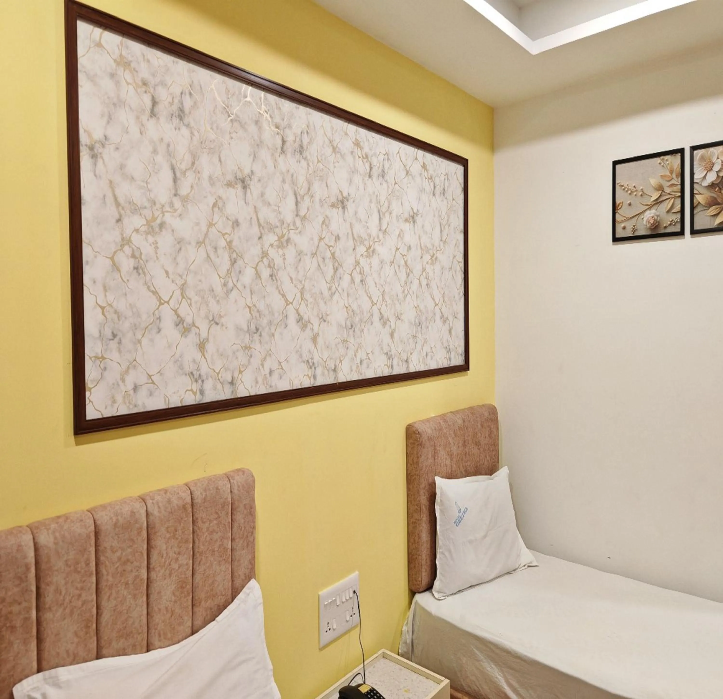 Photo of the whole room, Bed in Hotel Geetha International