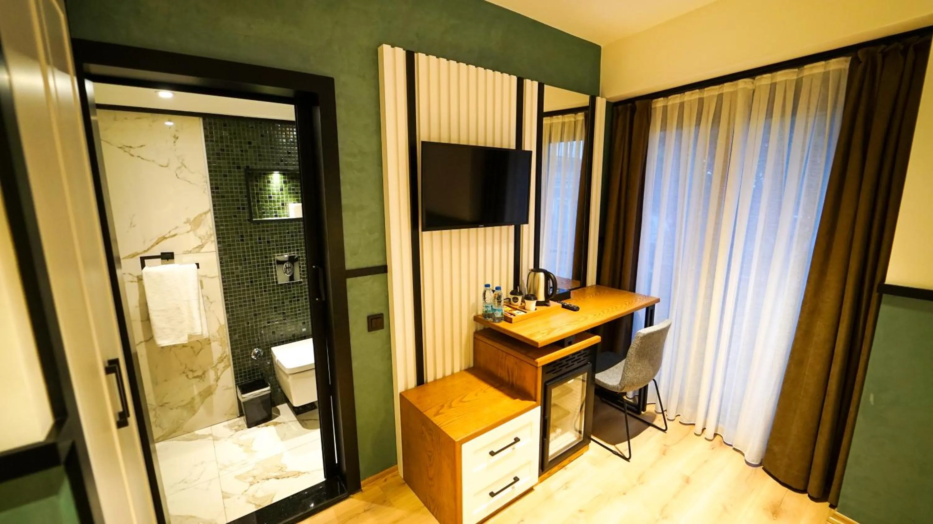 Bathroom, Bed in Fragments Hotel
