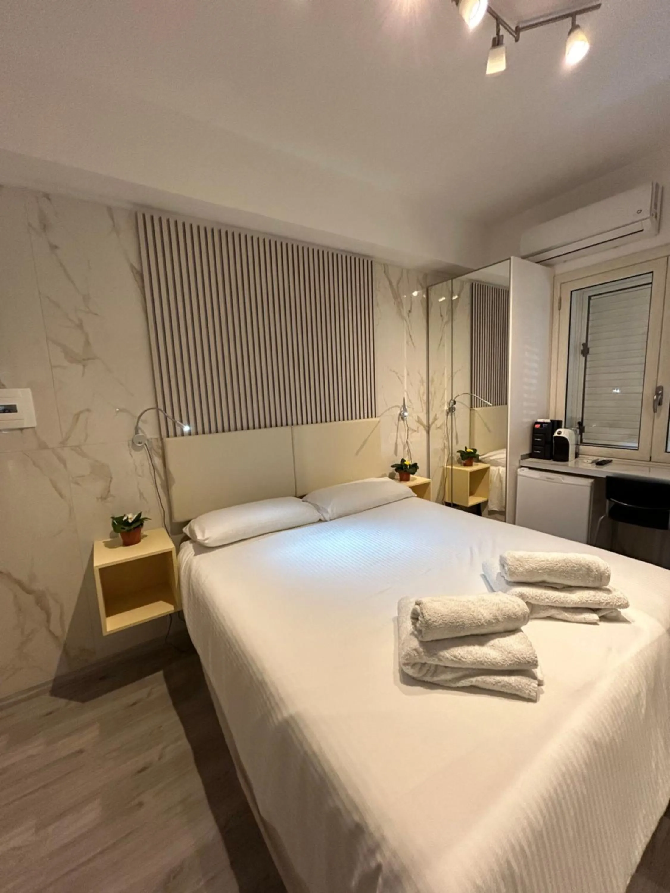 Bed in Confort Suites